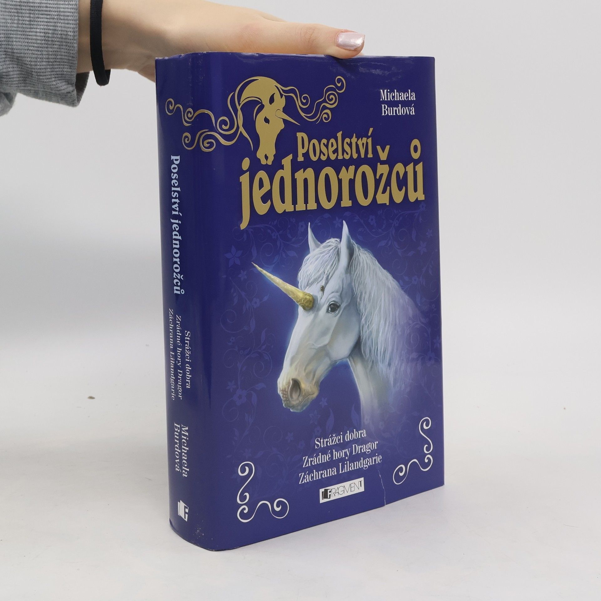 Michaela Burdová Poselství jednorožců. Strážci dobra. Zrádné hory Dragor. Záchrana Lilandgarie. 1. - 3. díl