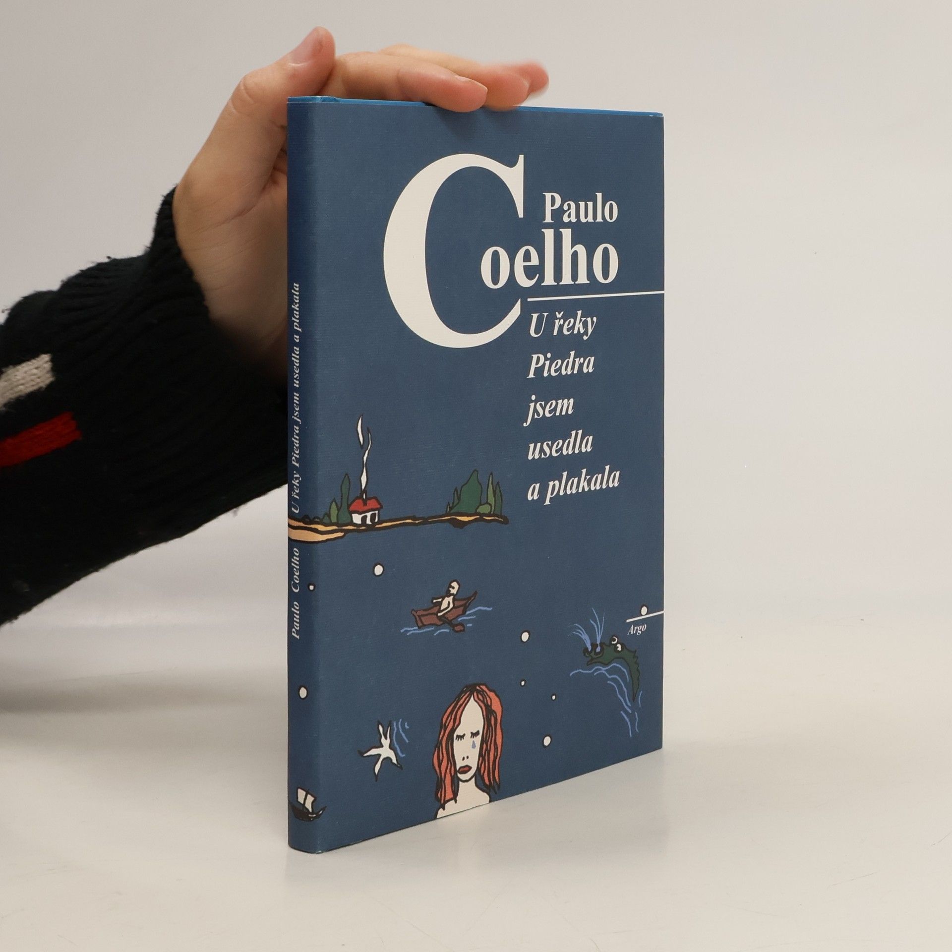 Paulo Coelho U řeky Piedra jsem usedla a plakala