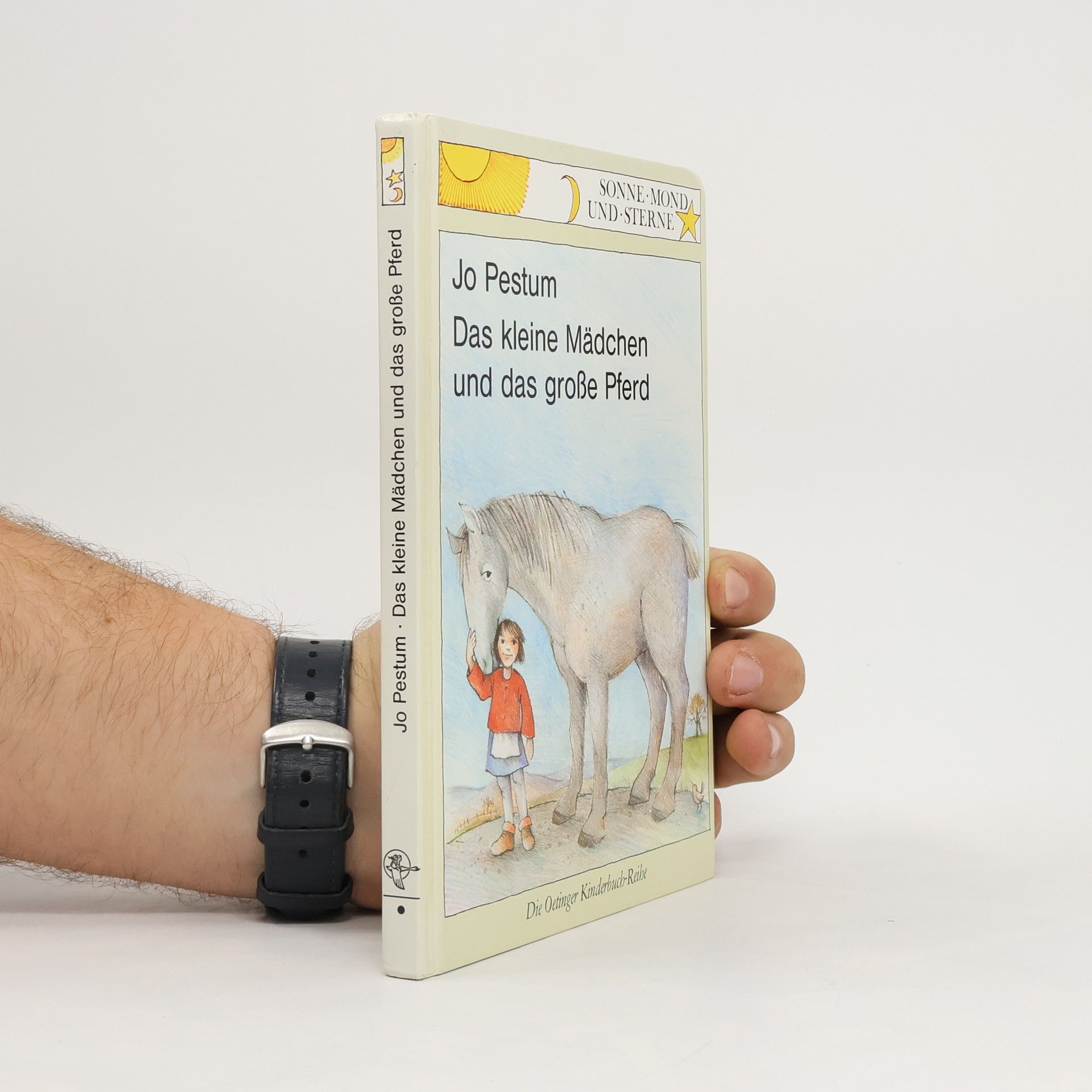 Das kleine Mädchen und das große Pferd