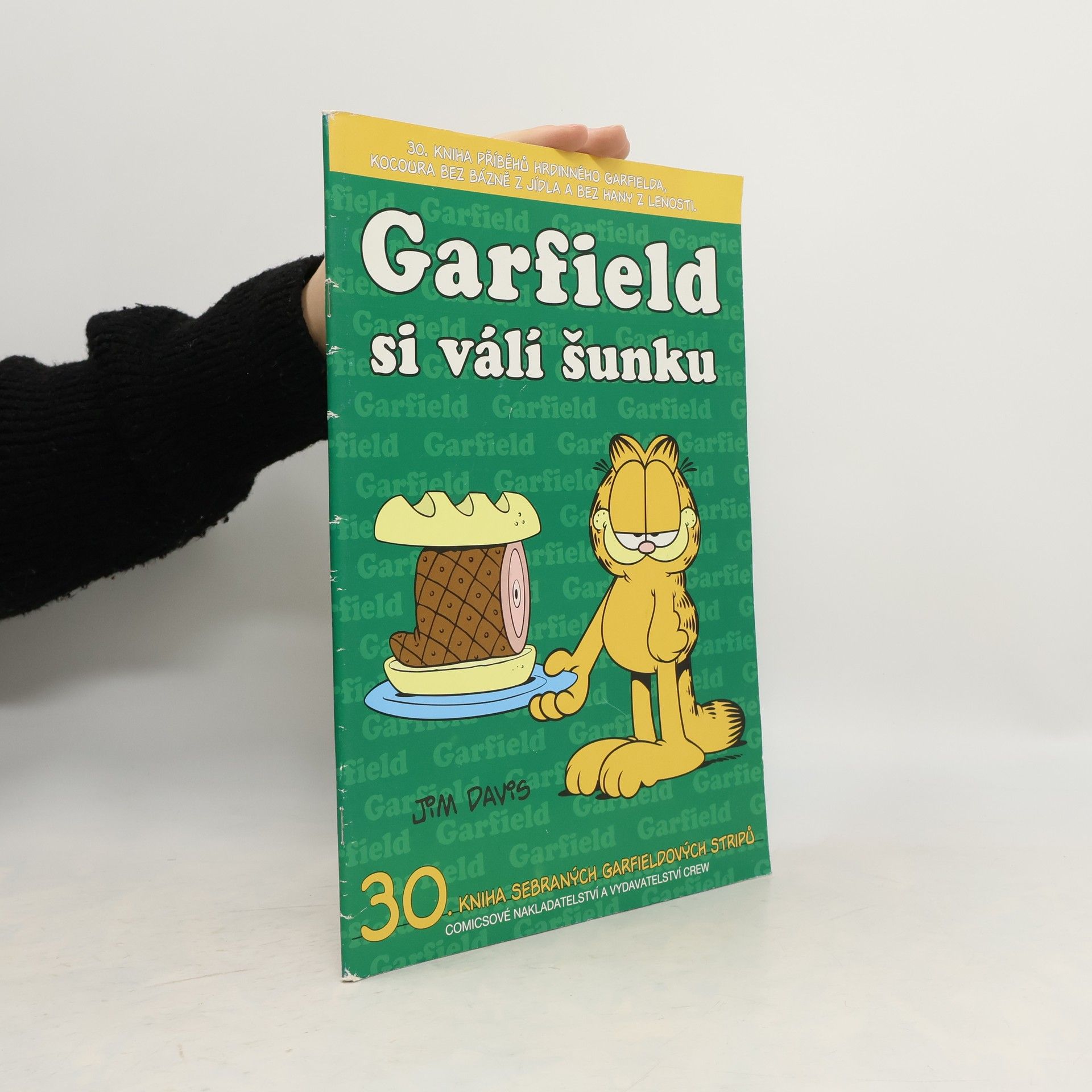 Jim Davis Garfield si válí šunku