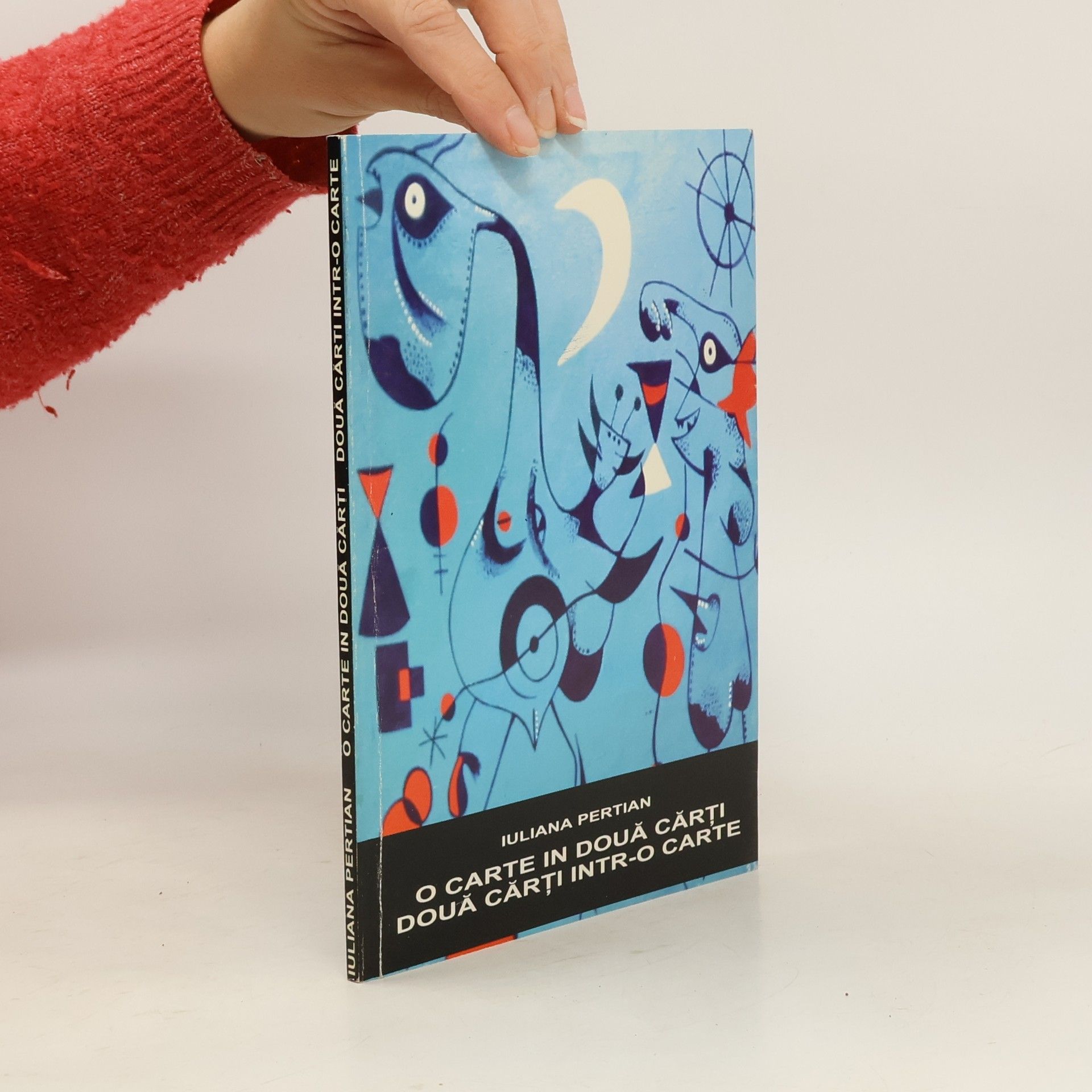 Iuliana Pertian O carte in două cărți, două cărți intr-o carte