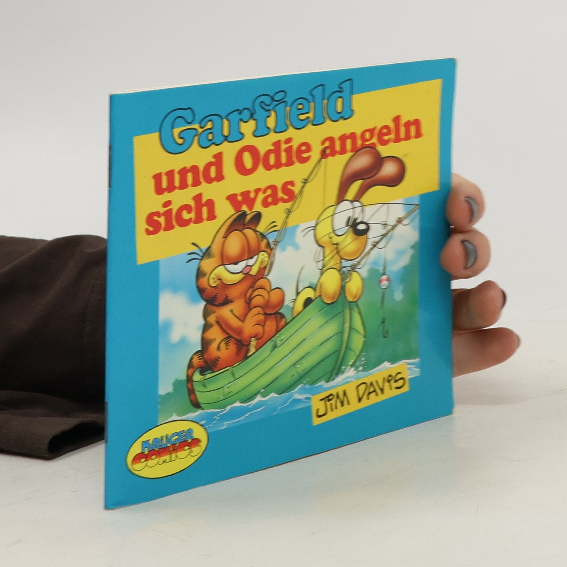 Jim Davis Garfield und Odie angeln sich was