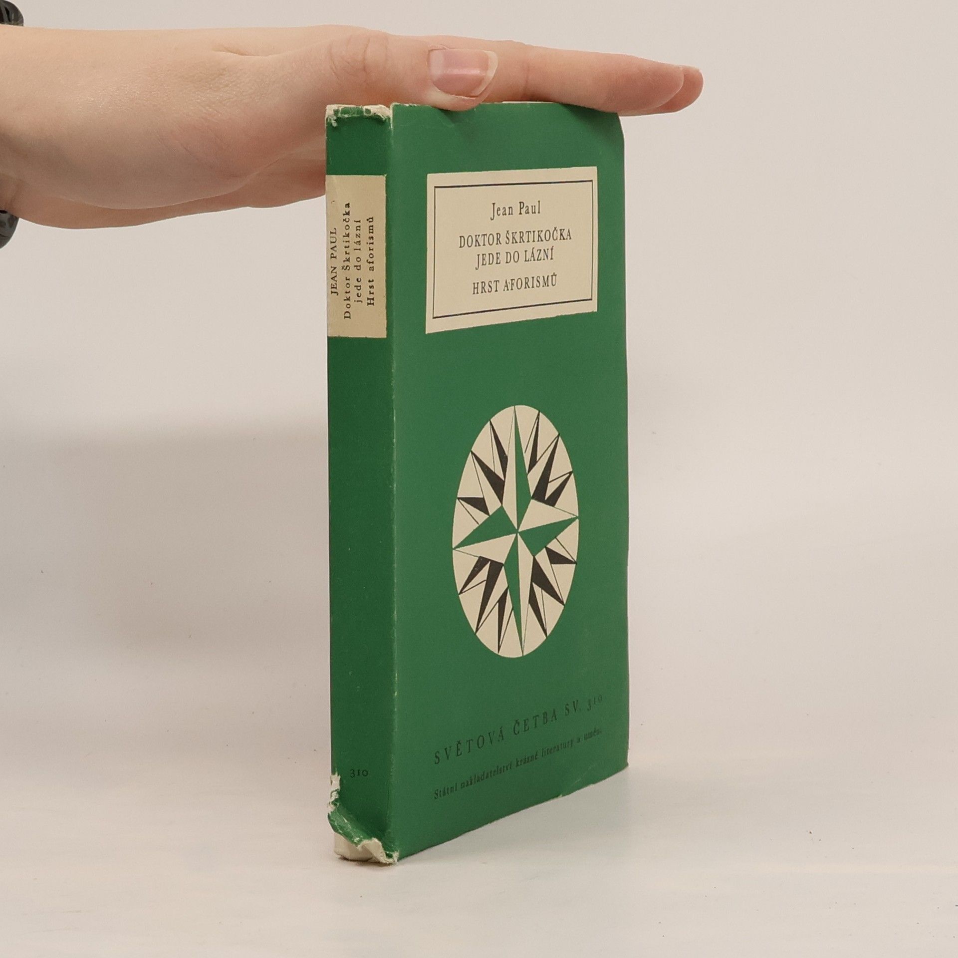 JeanPaul Belmondo Doktor Škrtikočka jede do lázní. Hrst aforismů