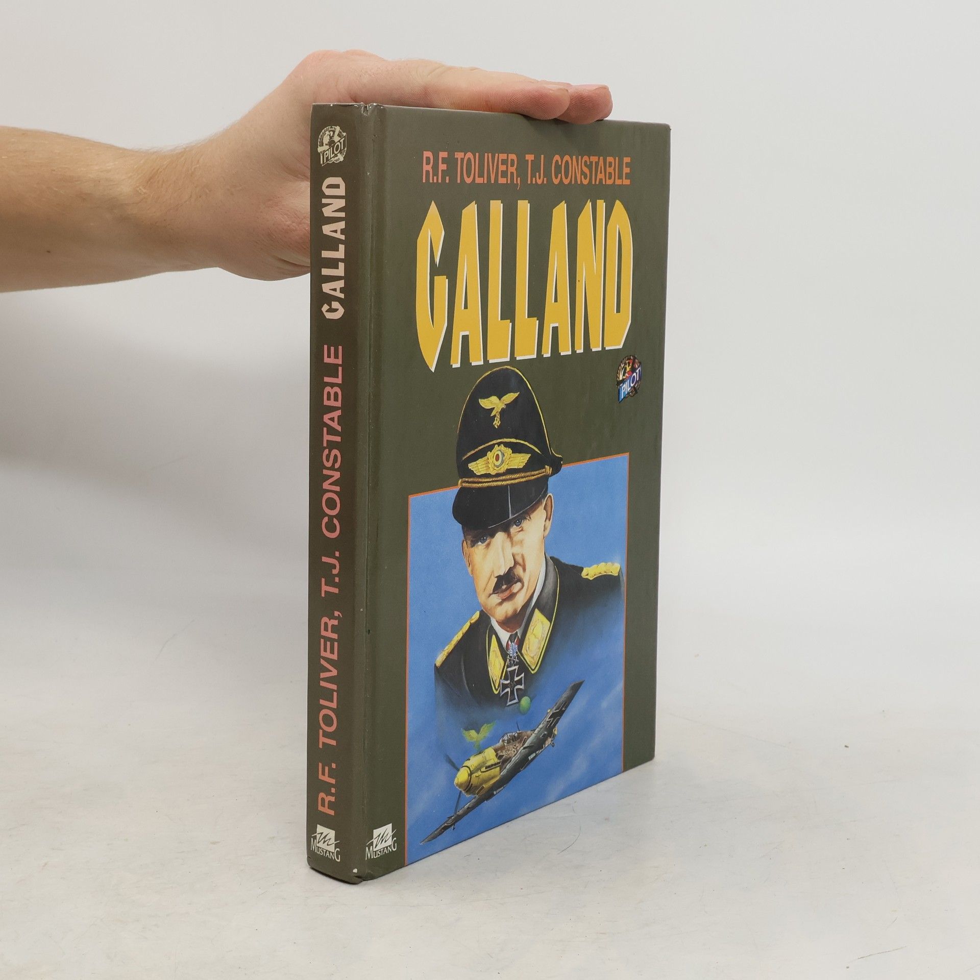 Raymond F. Toliver Galland