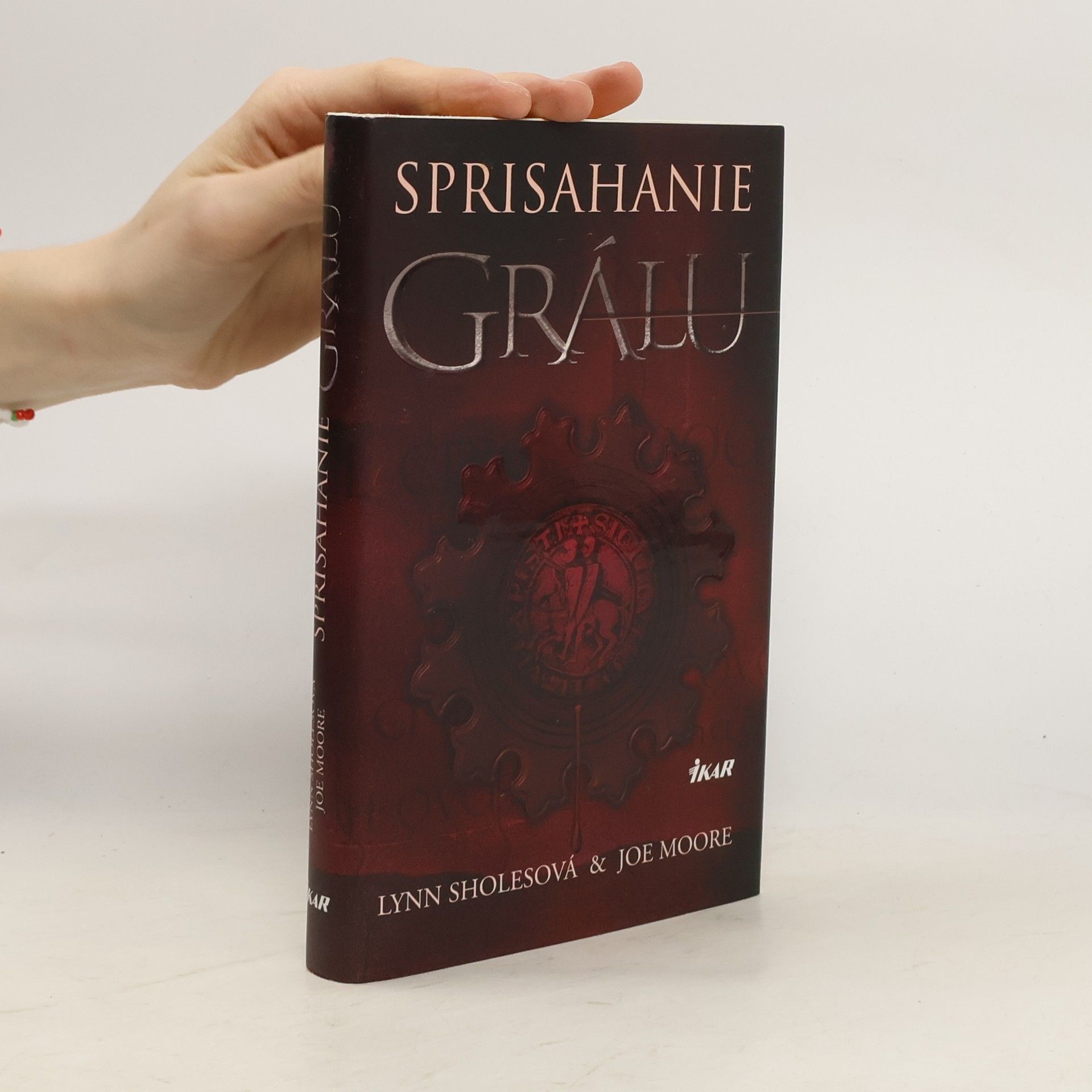 Lynn Sholes Sprisahanie grálu