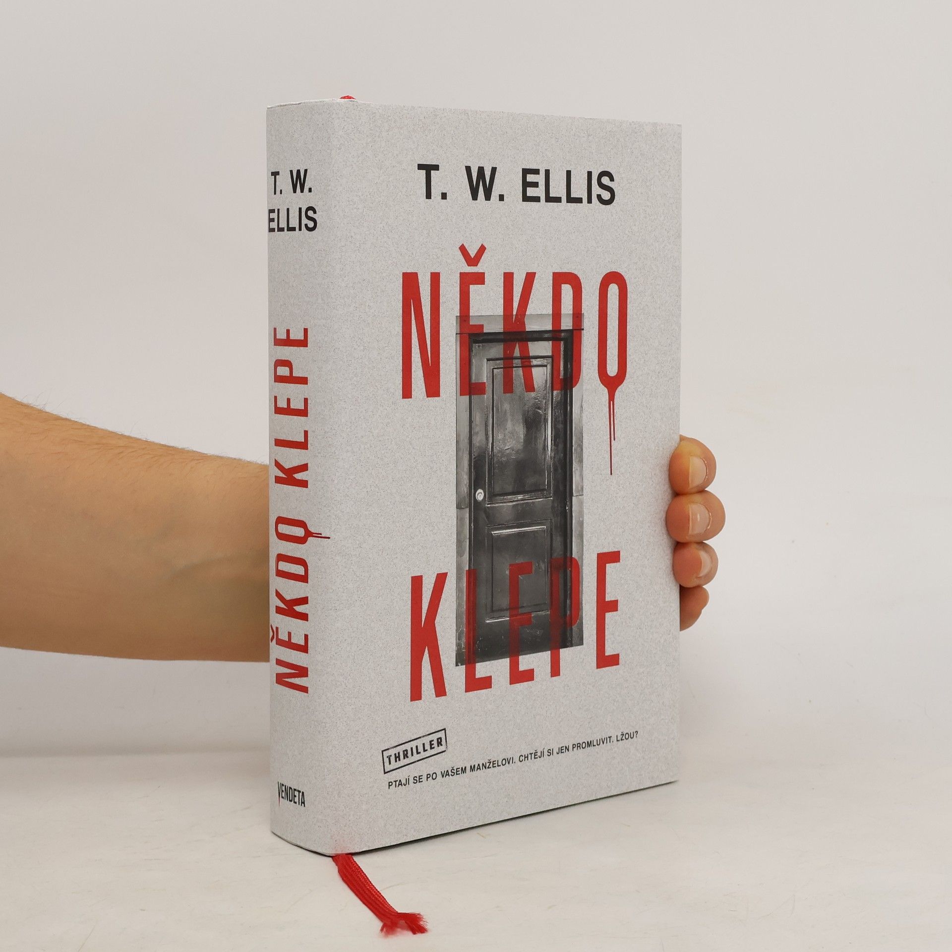 Tom Wood Někdo klepe