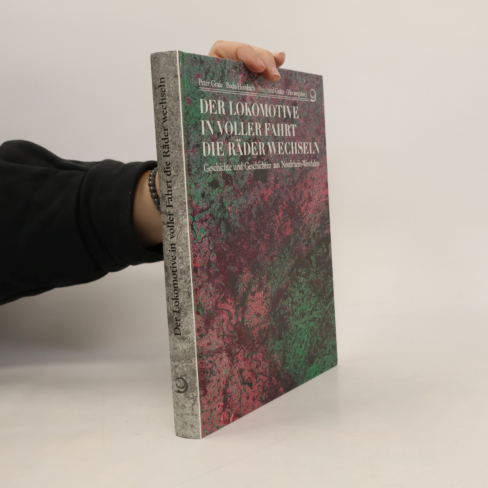 Peter Grafe Der Lokomotive in voller Fahrt die Räder wechseln