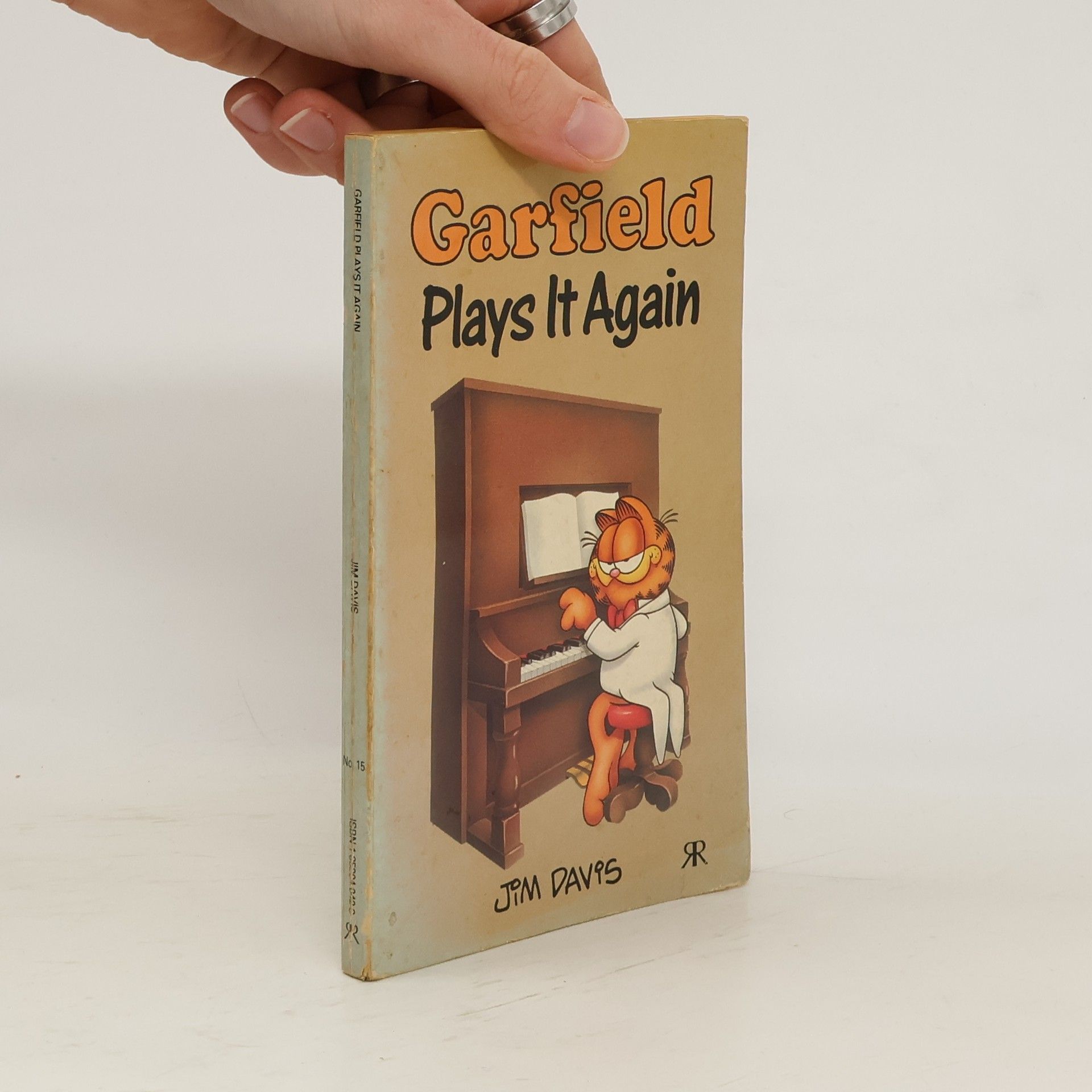 Jim Davis Garfield Plays it Again.