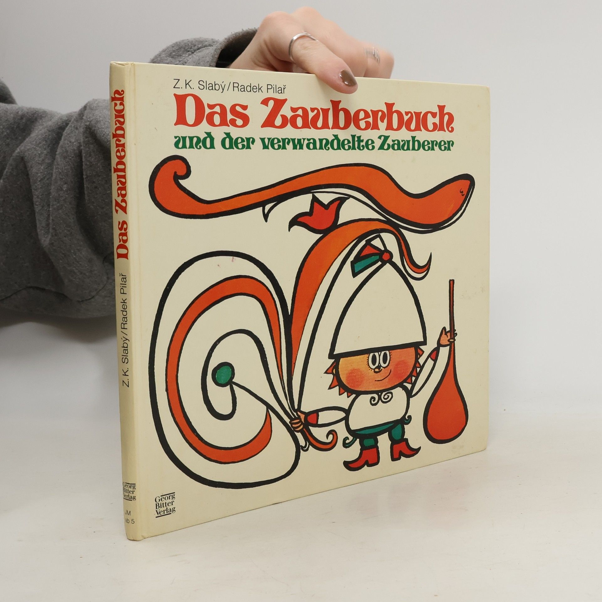 Das Zauberbuch und der verwandelte Zauberer