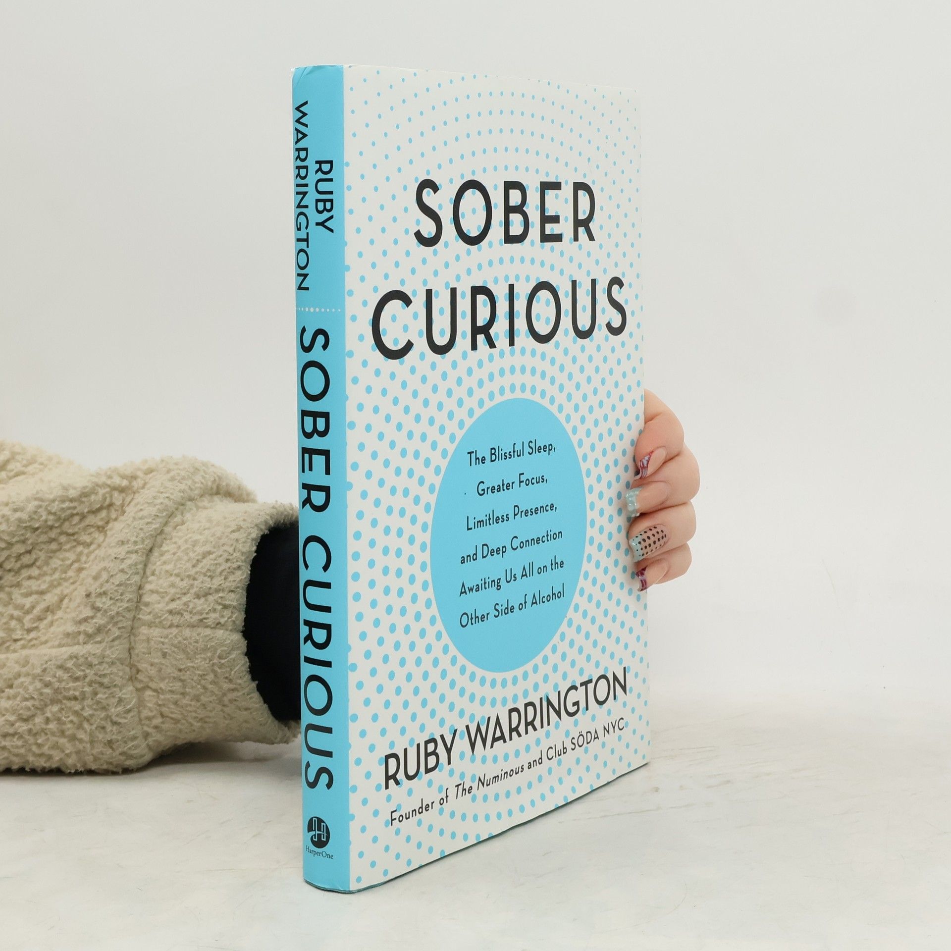 Sober curious : the blissful sleep, greater focus, limitless presence, and deep connection awaiting us all on the other side of alcohol