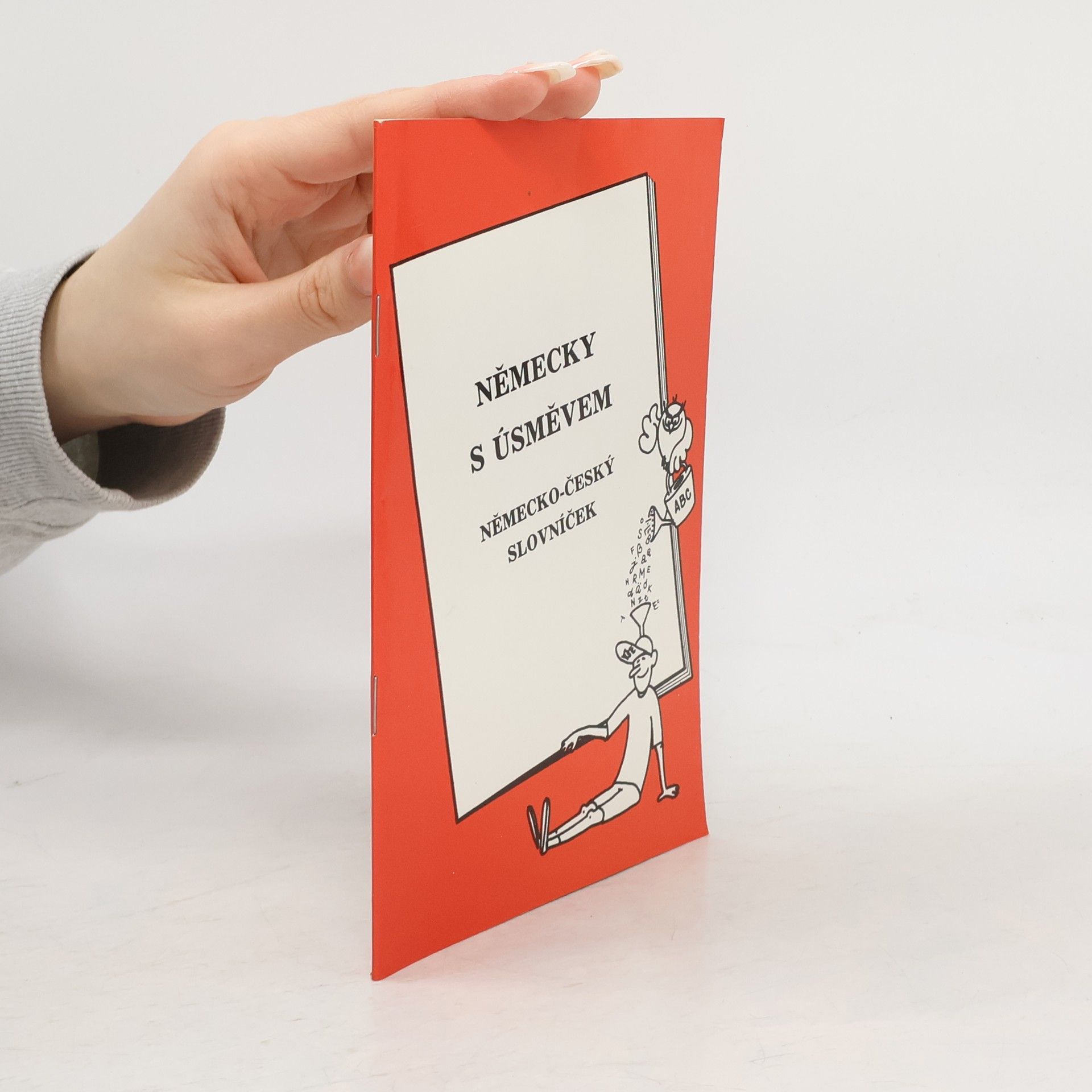 Kolektiv autorů Německy s úsměvem. Německo-český slovníček