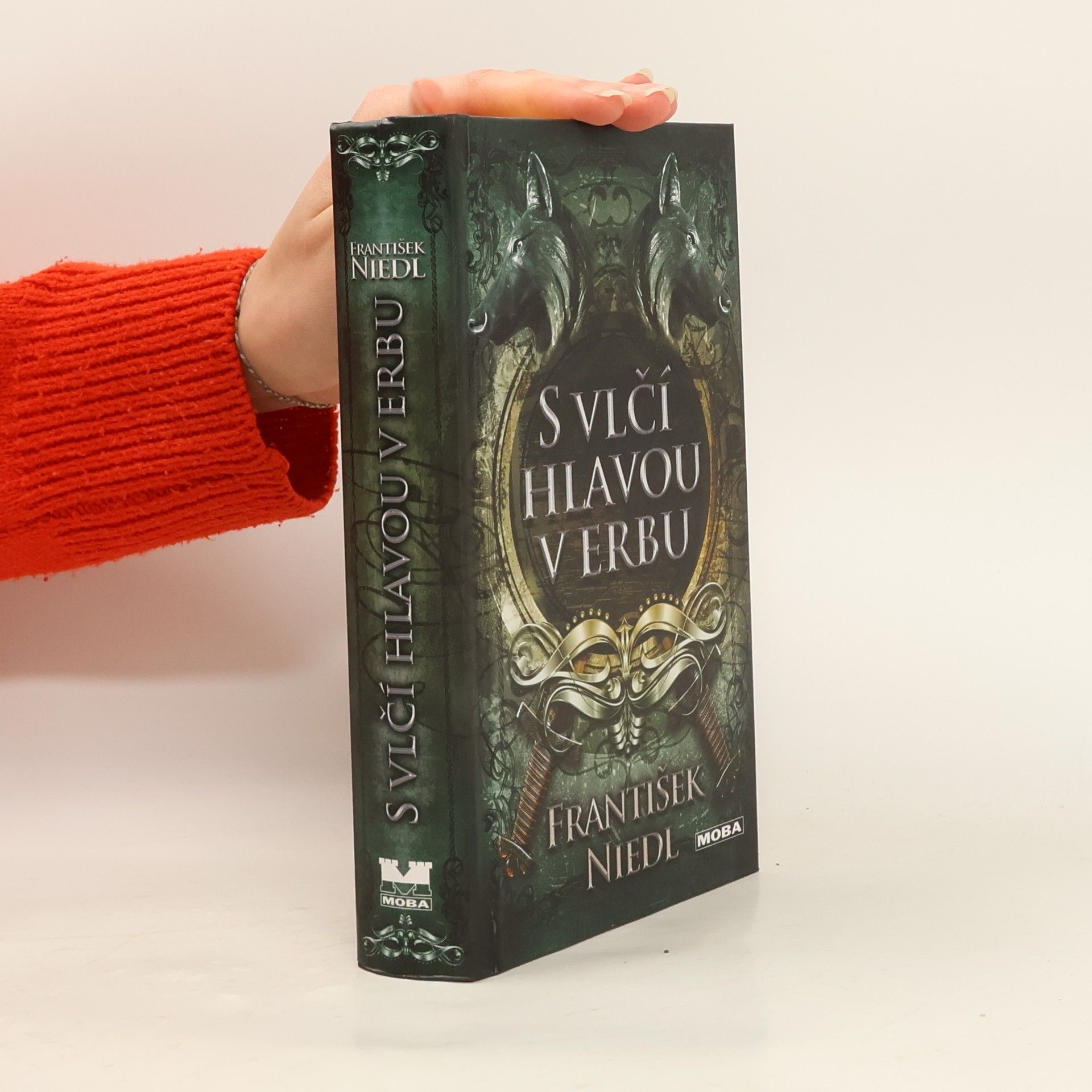 S vlčí hlavou v erbu