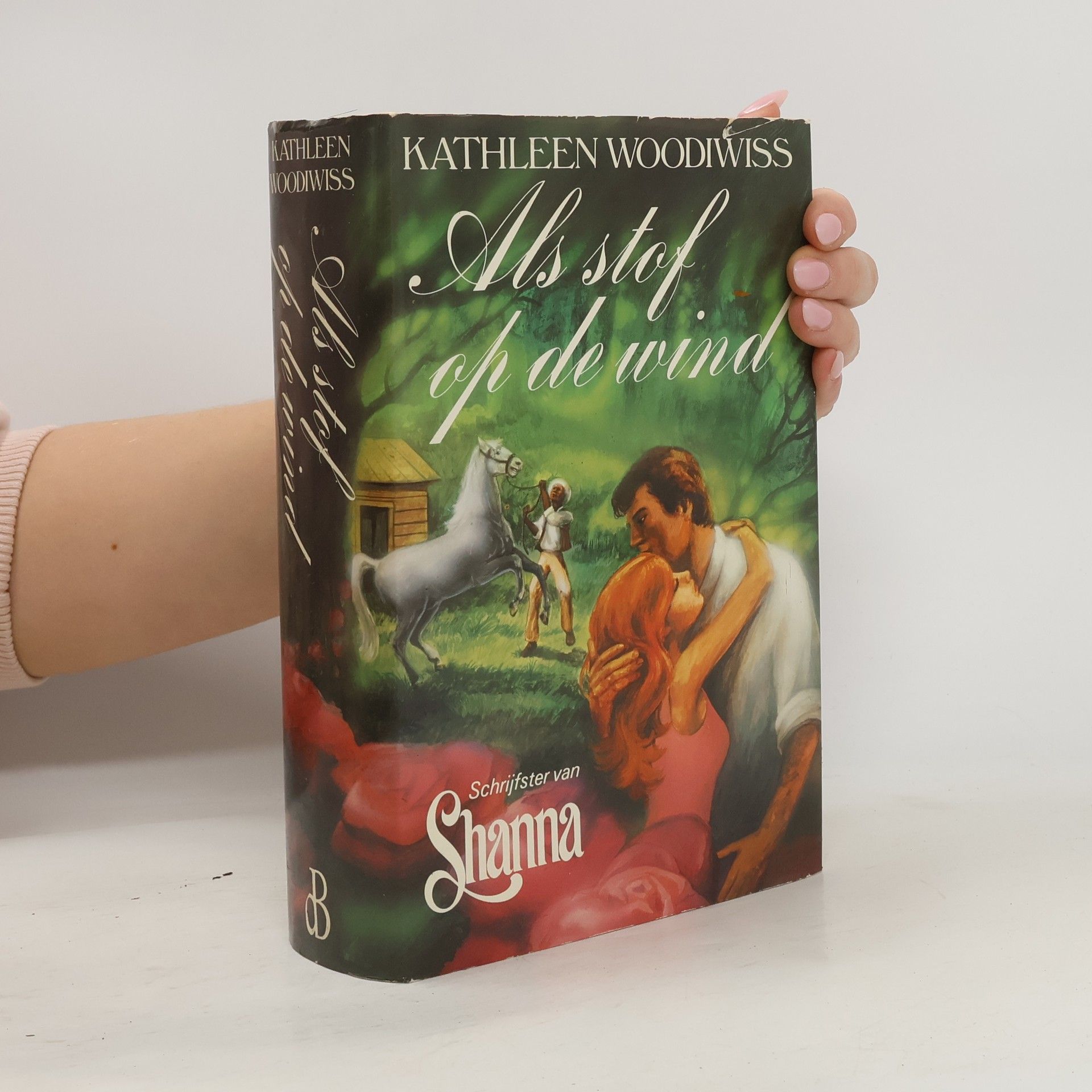 Kathleen E. Woodiwiss Als stof op de wind