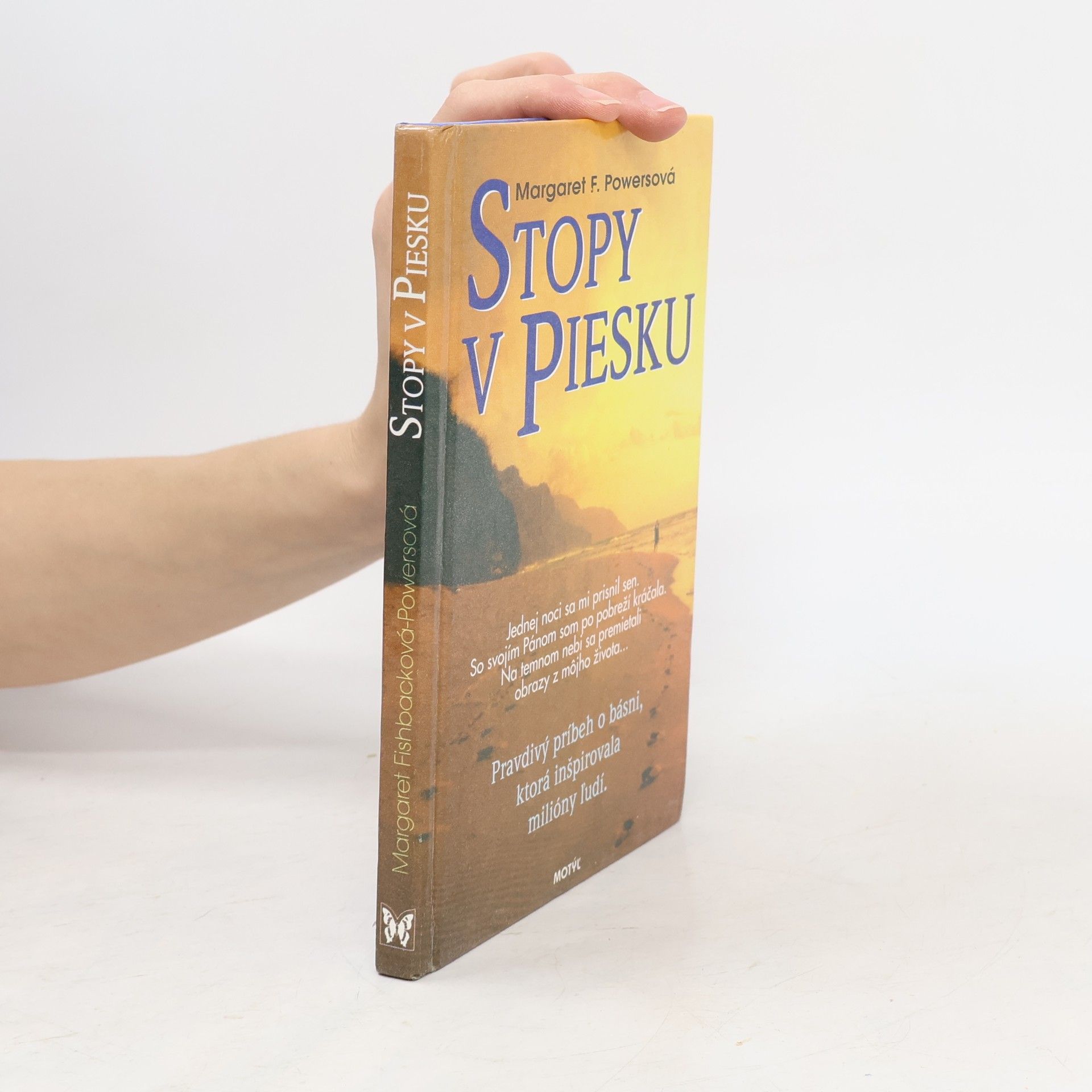 Stopy v piesku
