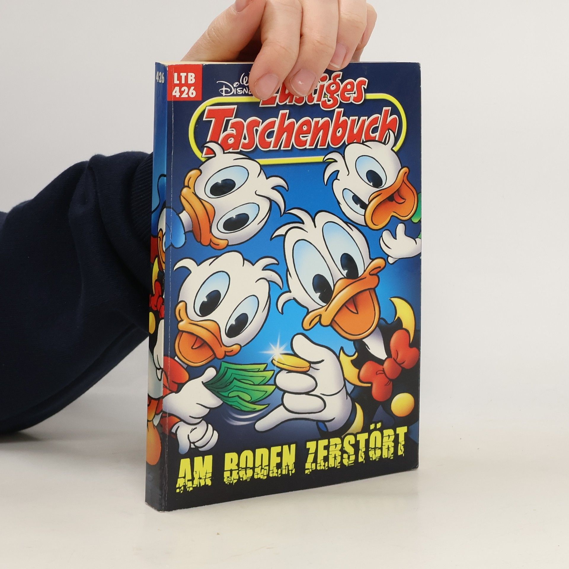 Walt Disney Lustiges Taschenbuch 426. Am Boden Zebstöbt