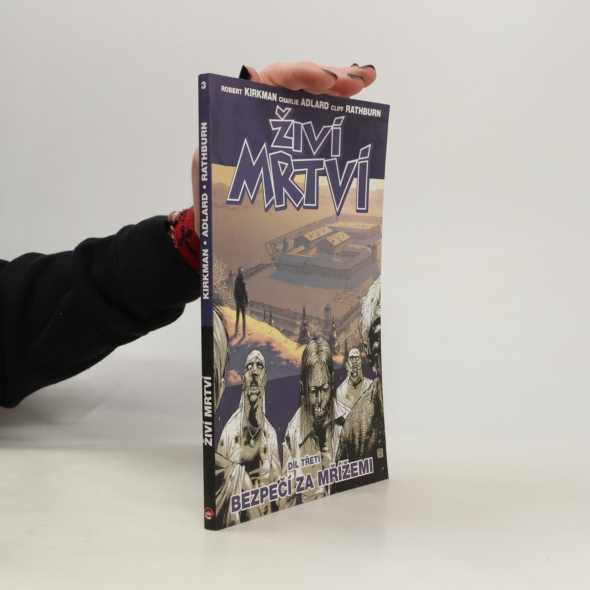 Živí mrtví. Díl třetí, Bezpečí za mřížemi