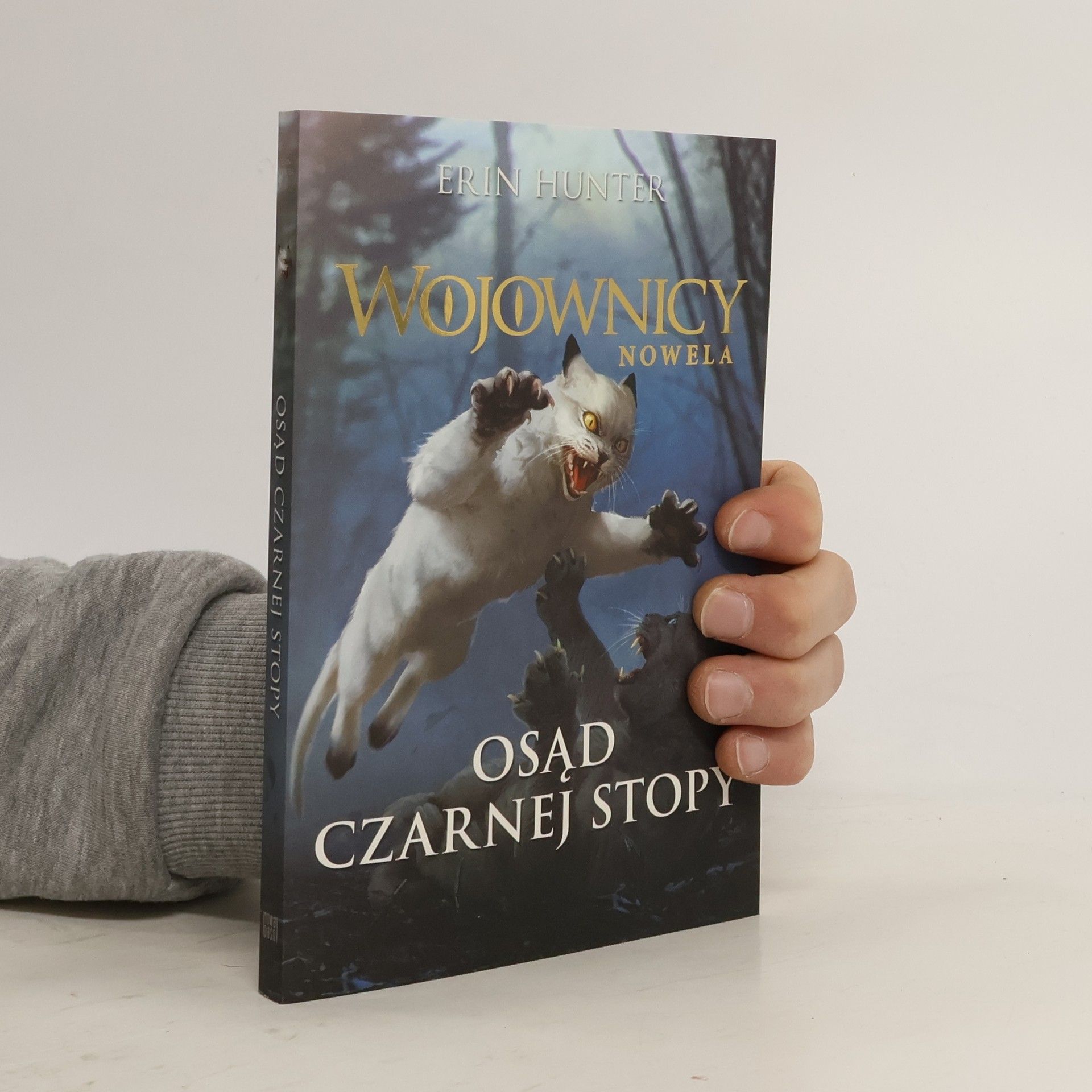 Erin Hunter Wojownicy. Nowela T.5 Osąd Czarnej Stopy