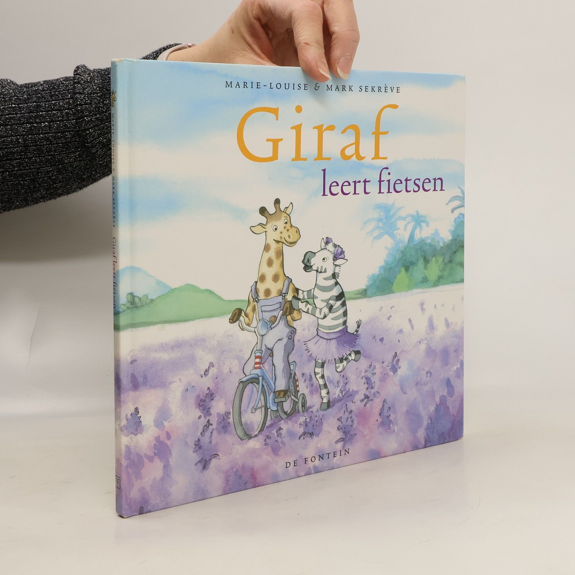 Marie-Louise Sekrève Giraf leert fietsen