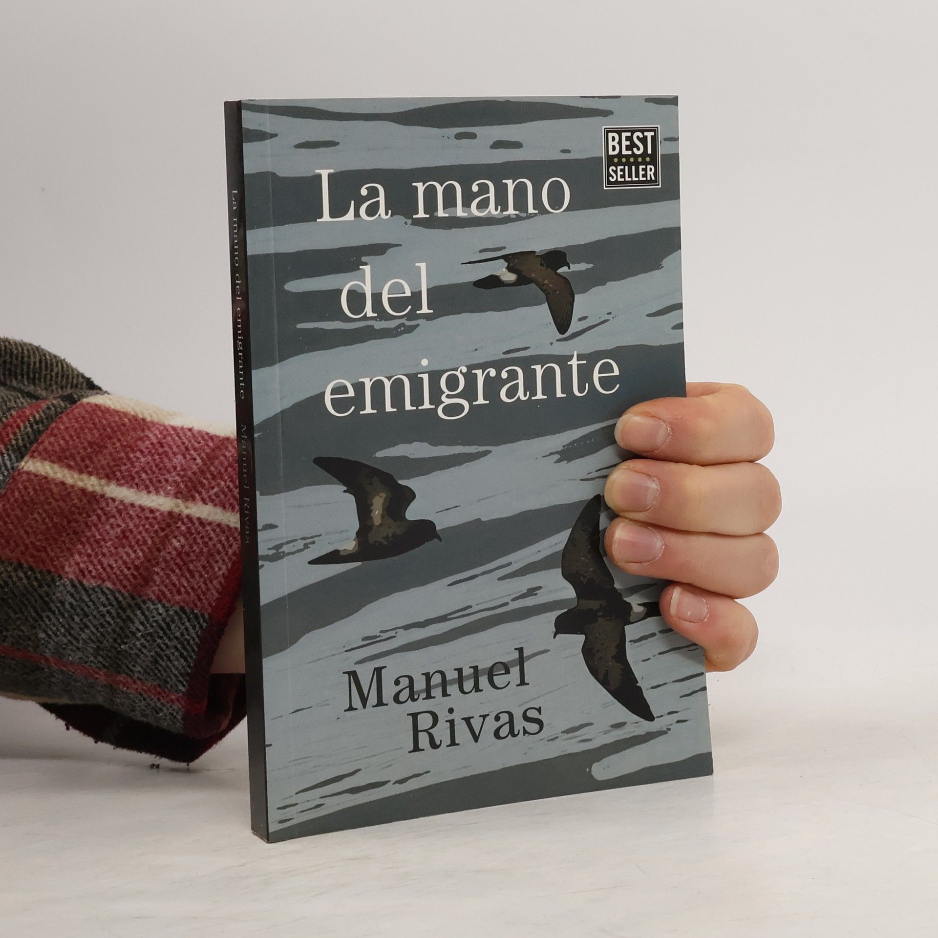 La mano del emigrante