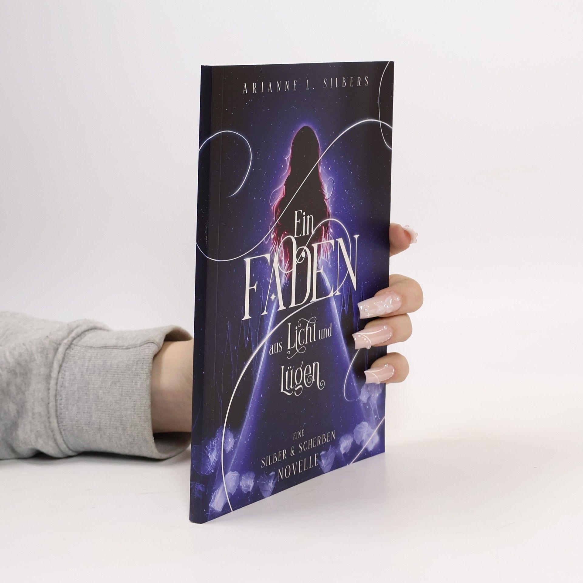 Arianne L. Silbers Silber und Scherben: Ein Faden aus Licht und Lügen