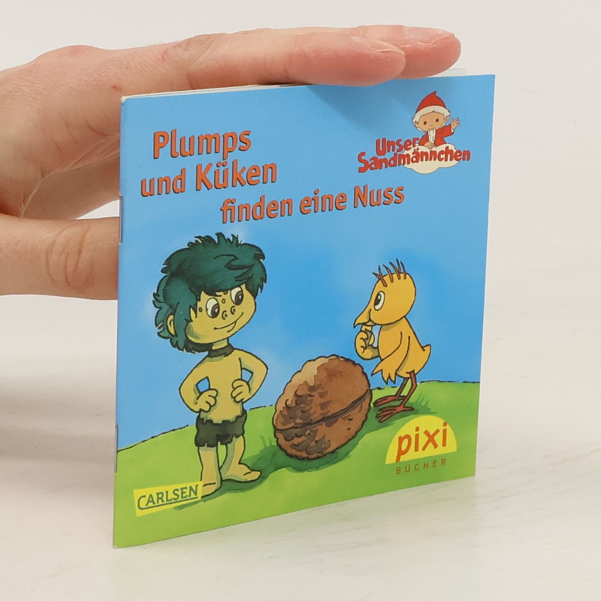 Kolektiv autorů Plumps und Küken finden eine Nuss