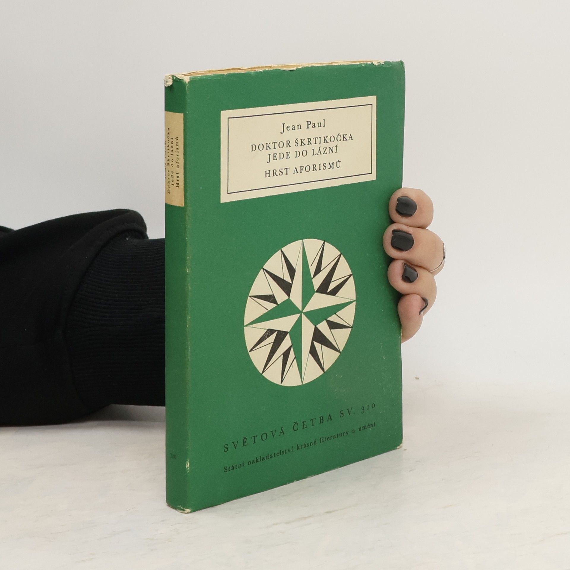 JeanPaul Belmondo Doktor Škrtikočka jede do lázní. Hrst aforismů