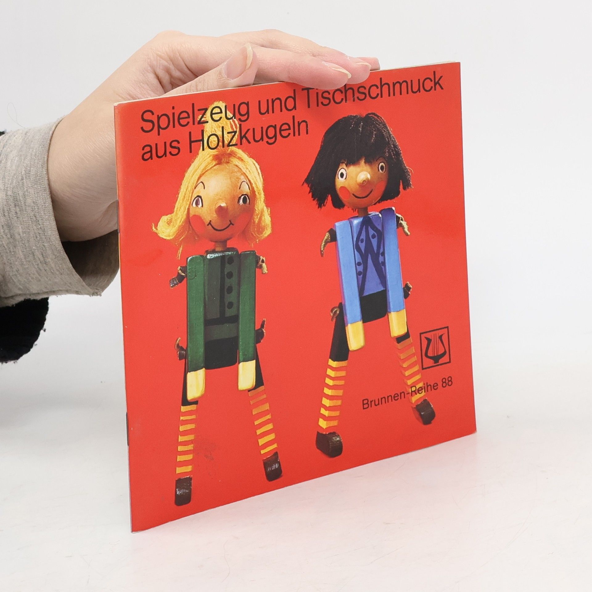 Spielzeug und Tischschmuck aus Holzkugeln