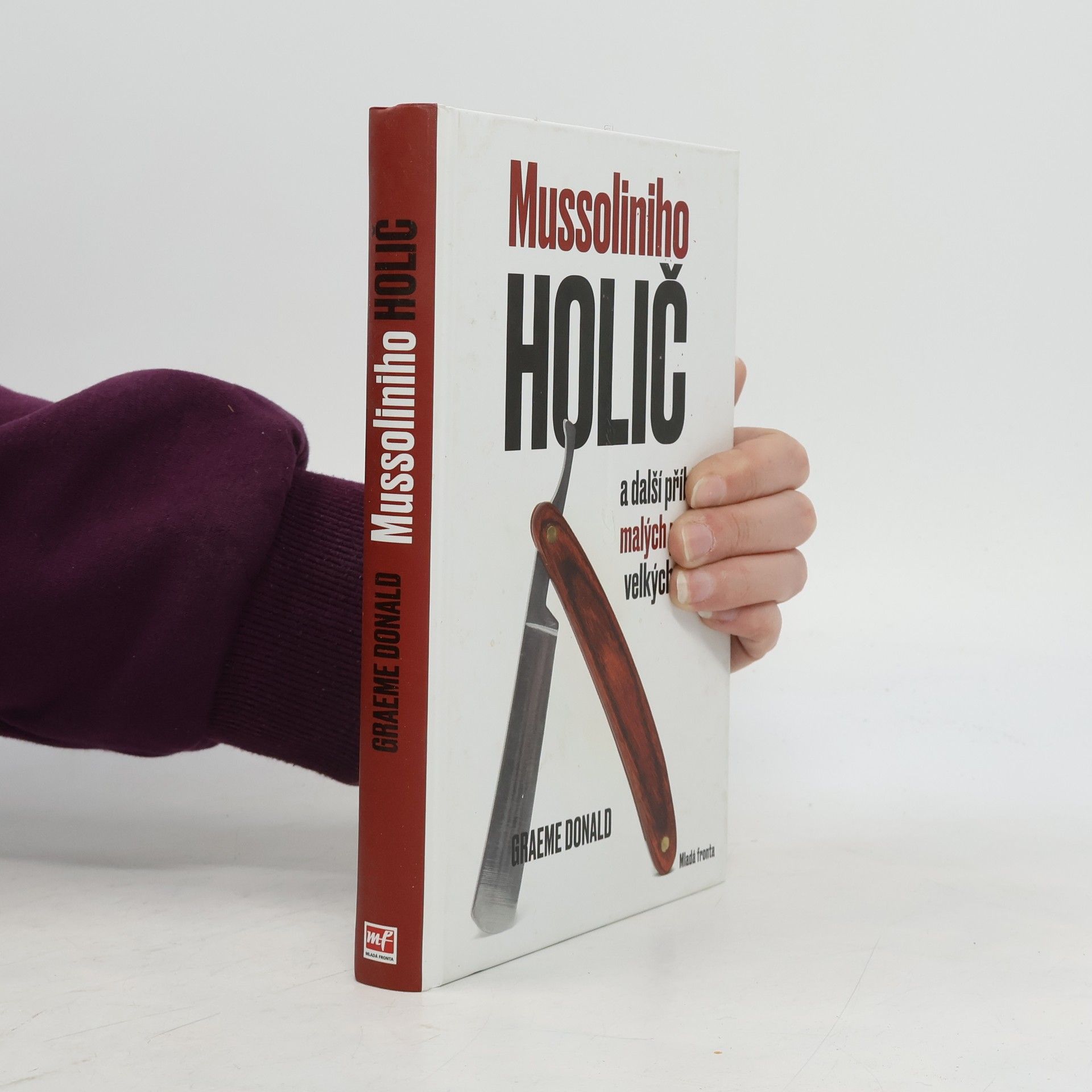 Graeme Donald Mussoliniho holič a další příběhy malých postav velkých dějin