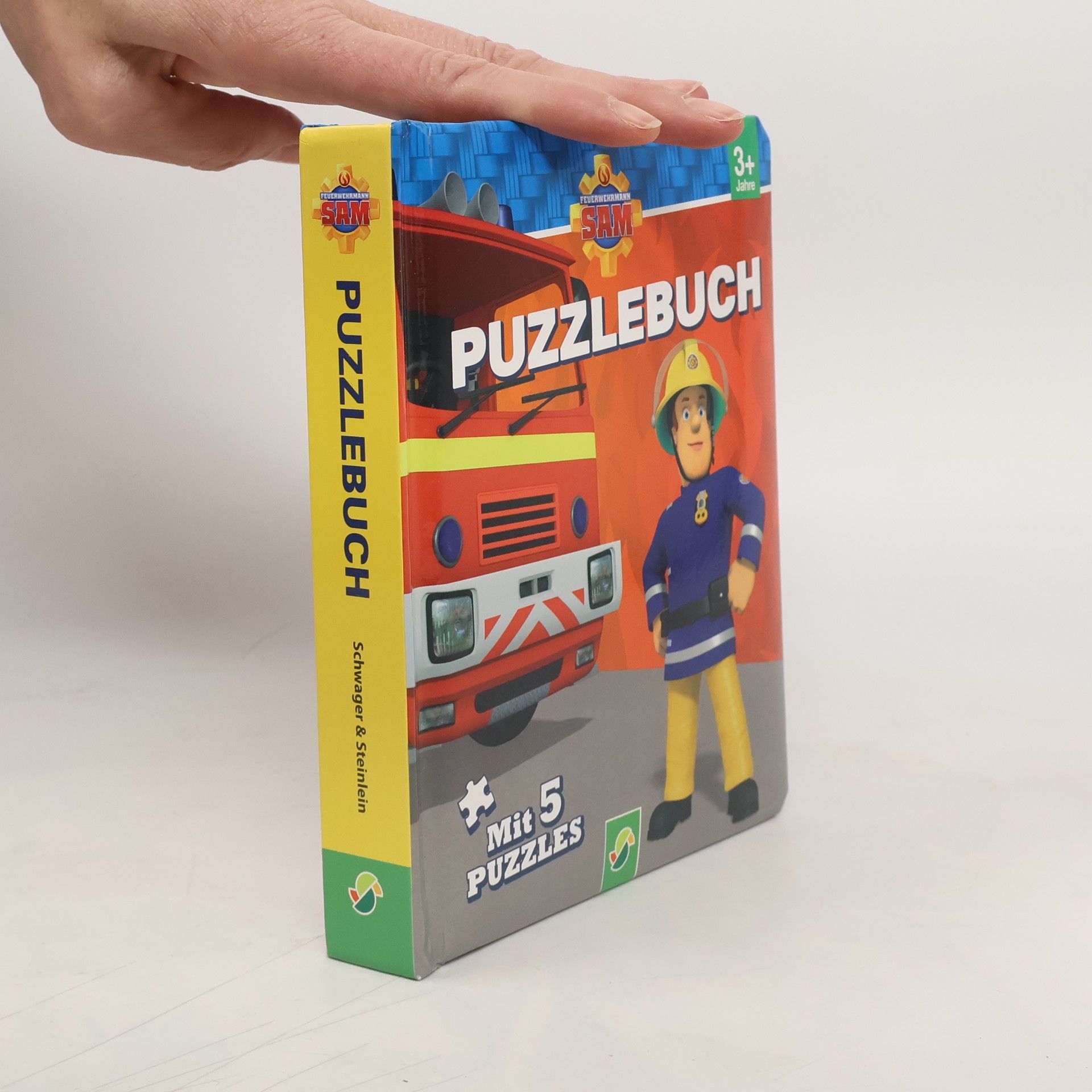 Kolektiv autorů Požárník Sam. Knížka s puzzle