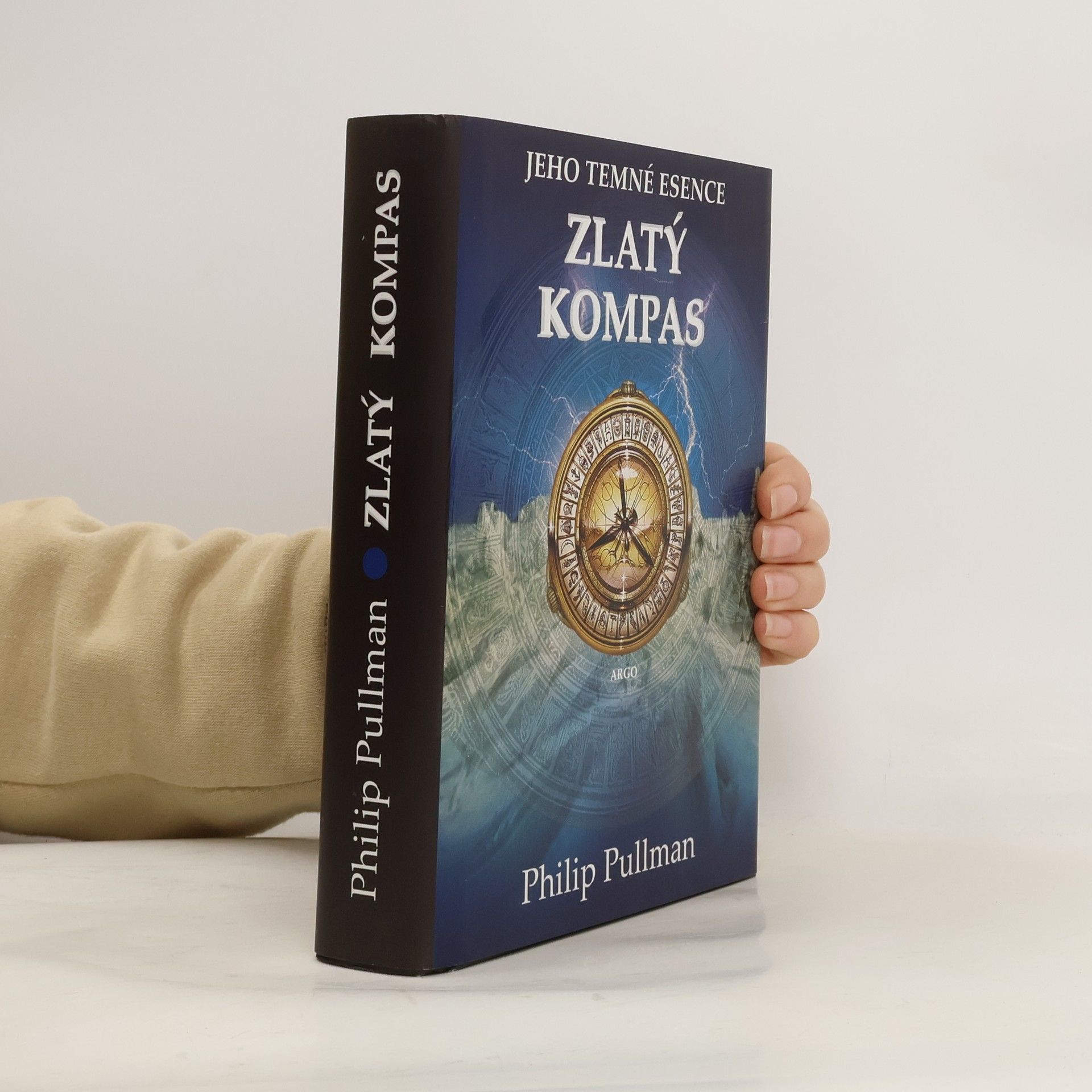 Jeho temné esence. Zlatý kompas.