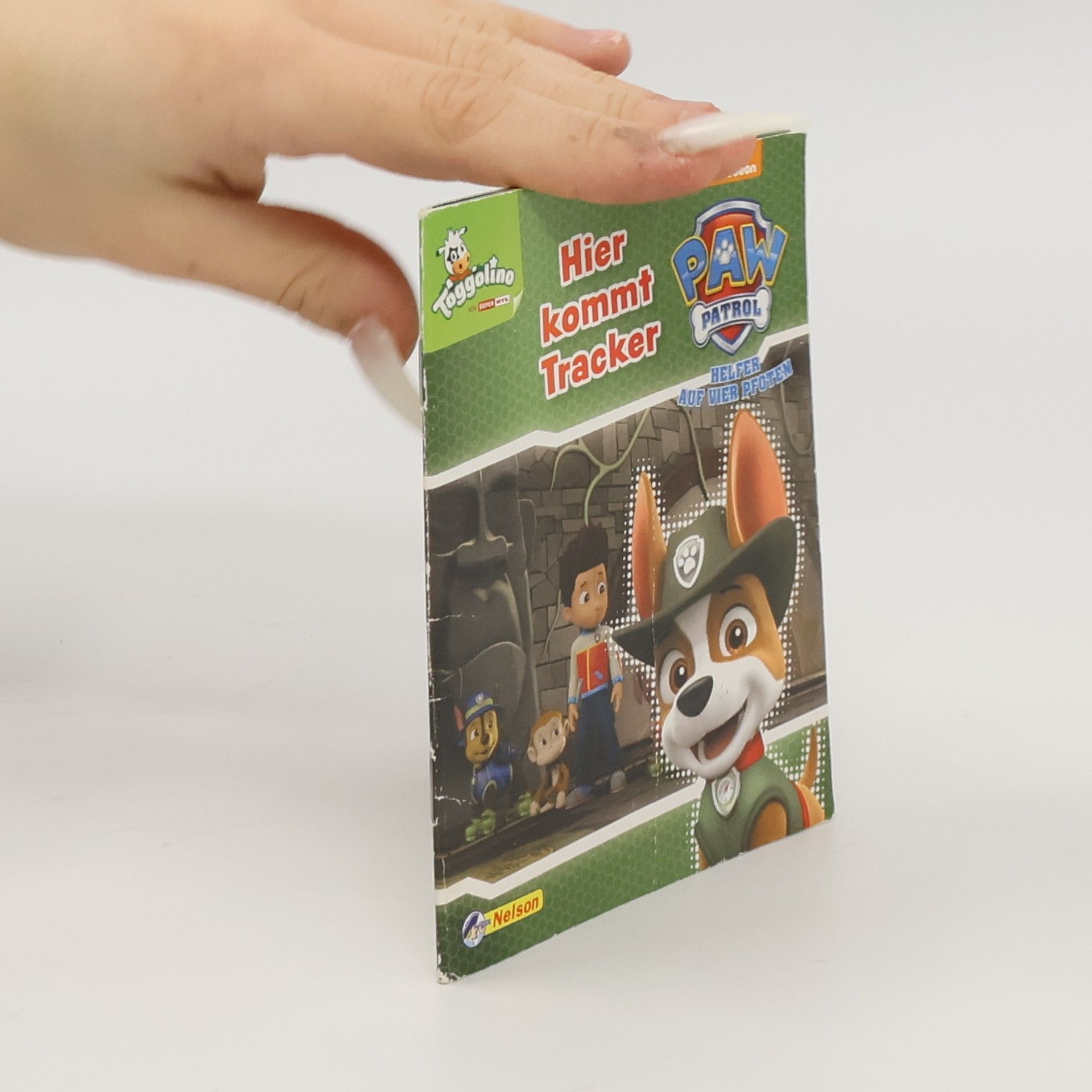 Kolektiv autorů Paw Patrol. Hier kommt Tracker