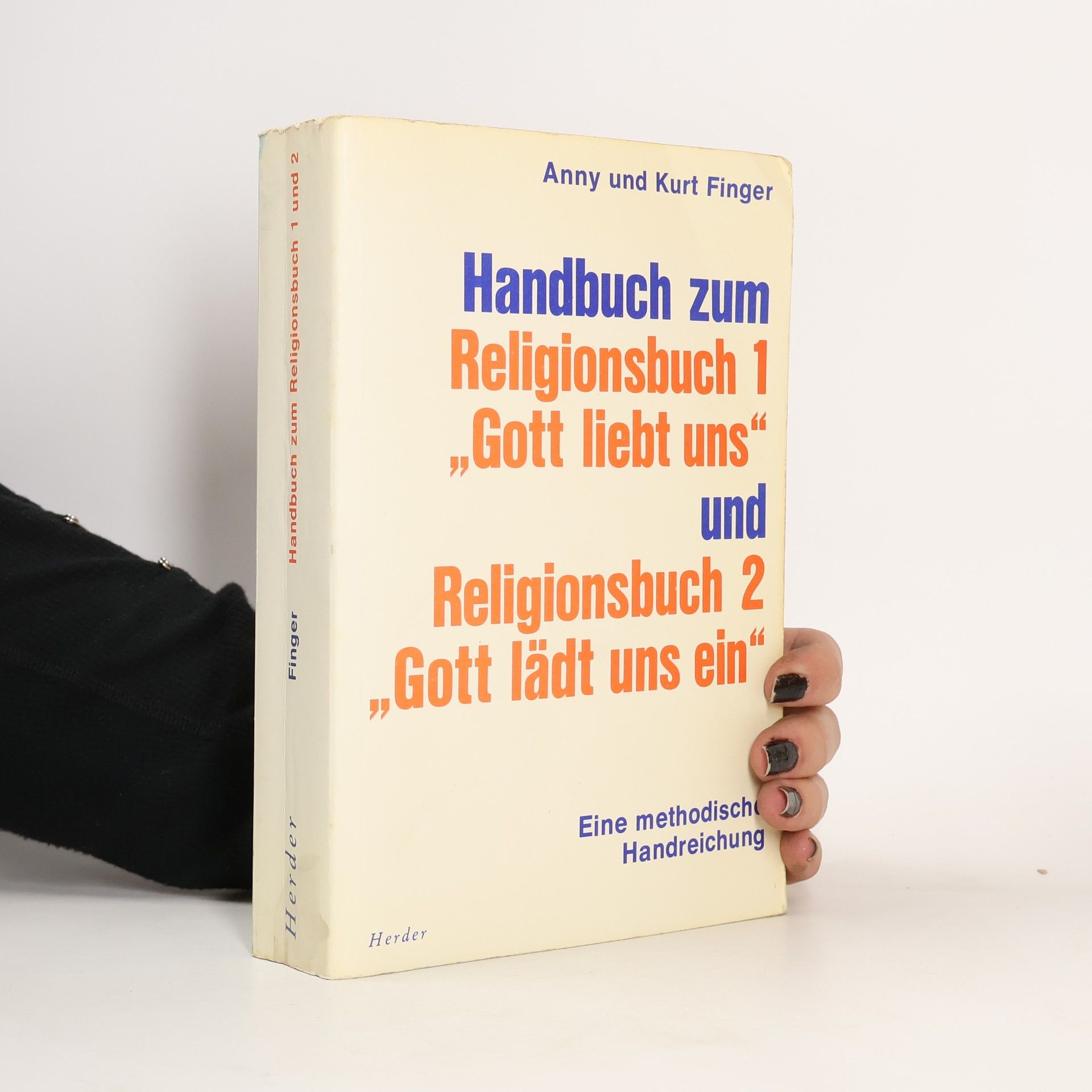 Handbuch zum Religionsbuch 1 [eins], "Gott liebt uns", und zum Religionsbuch 2 [zwei], "Gott lädt uns ein" - Hauptband