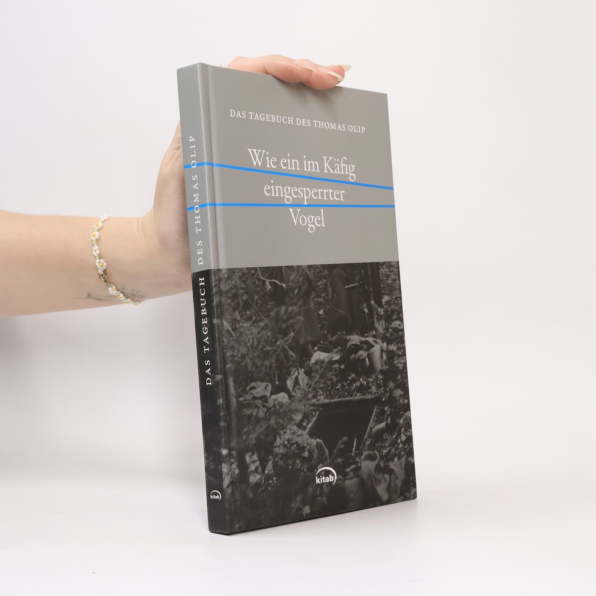 Thomas Olip Wie ein im Käfig eingesperrter Vogel