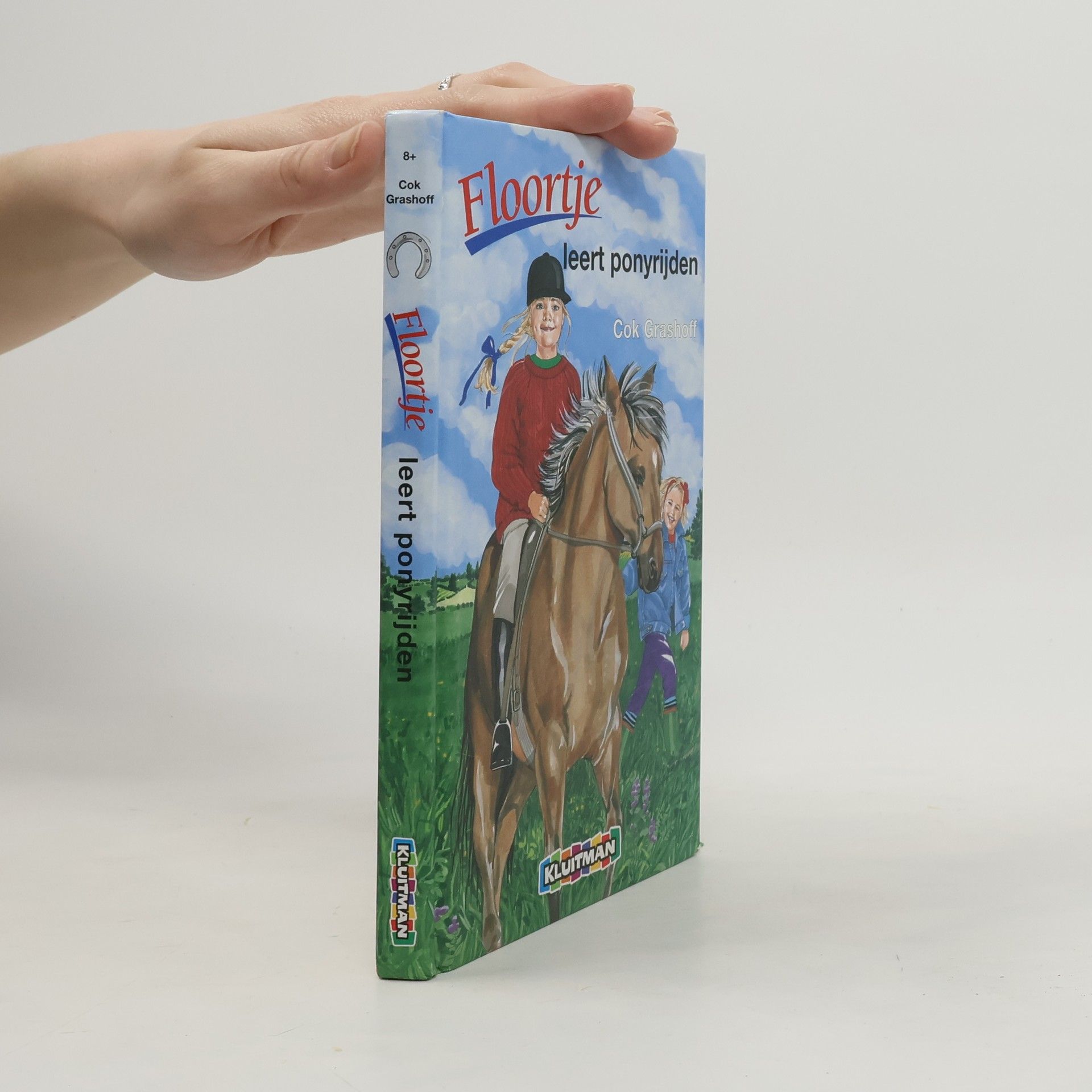 Floortje leert ponyrijden