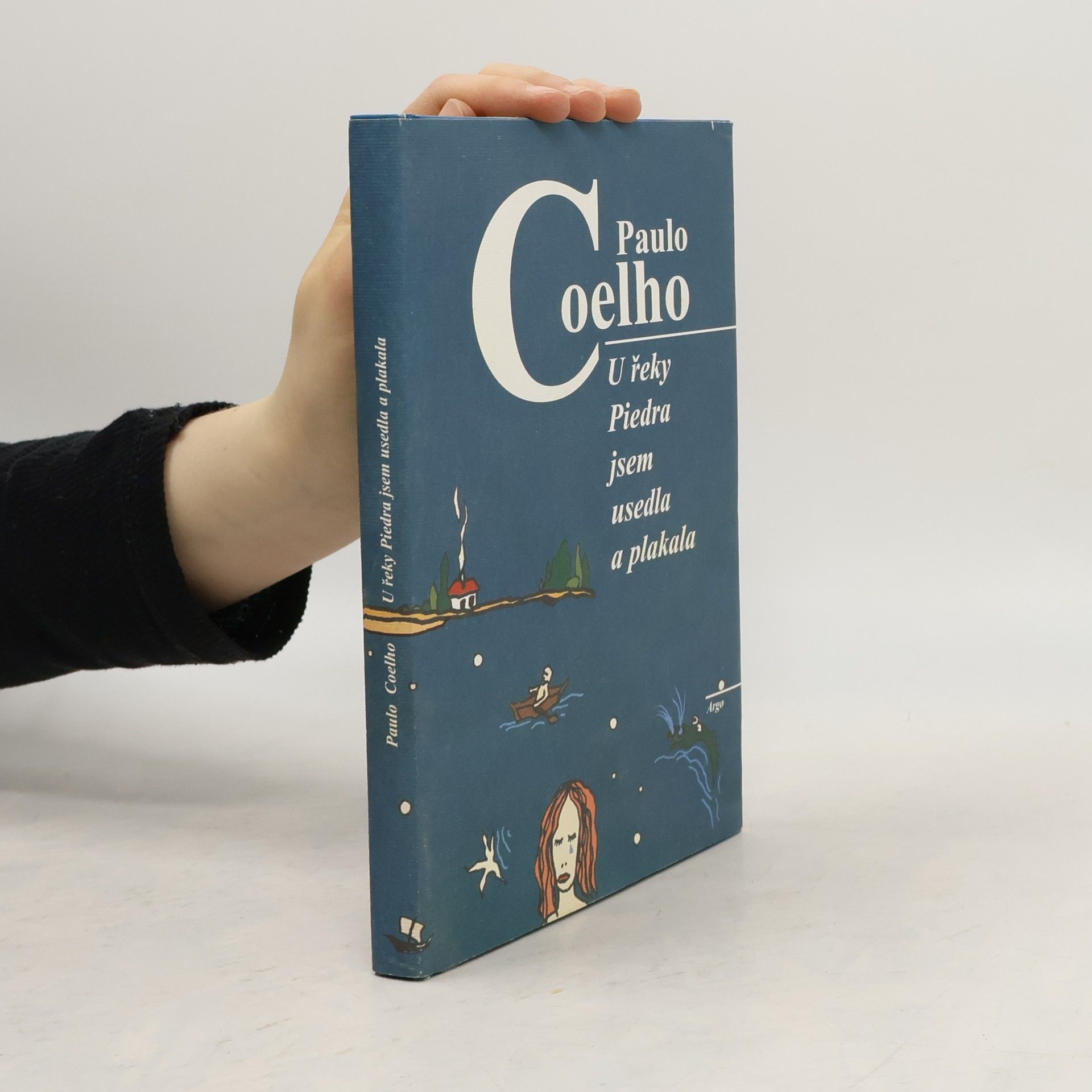 Paulo Coelho U řeky Piedra jsem usedla a plakala