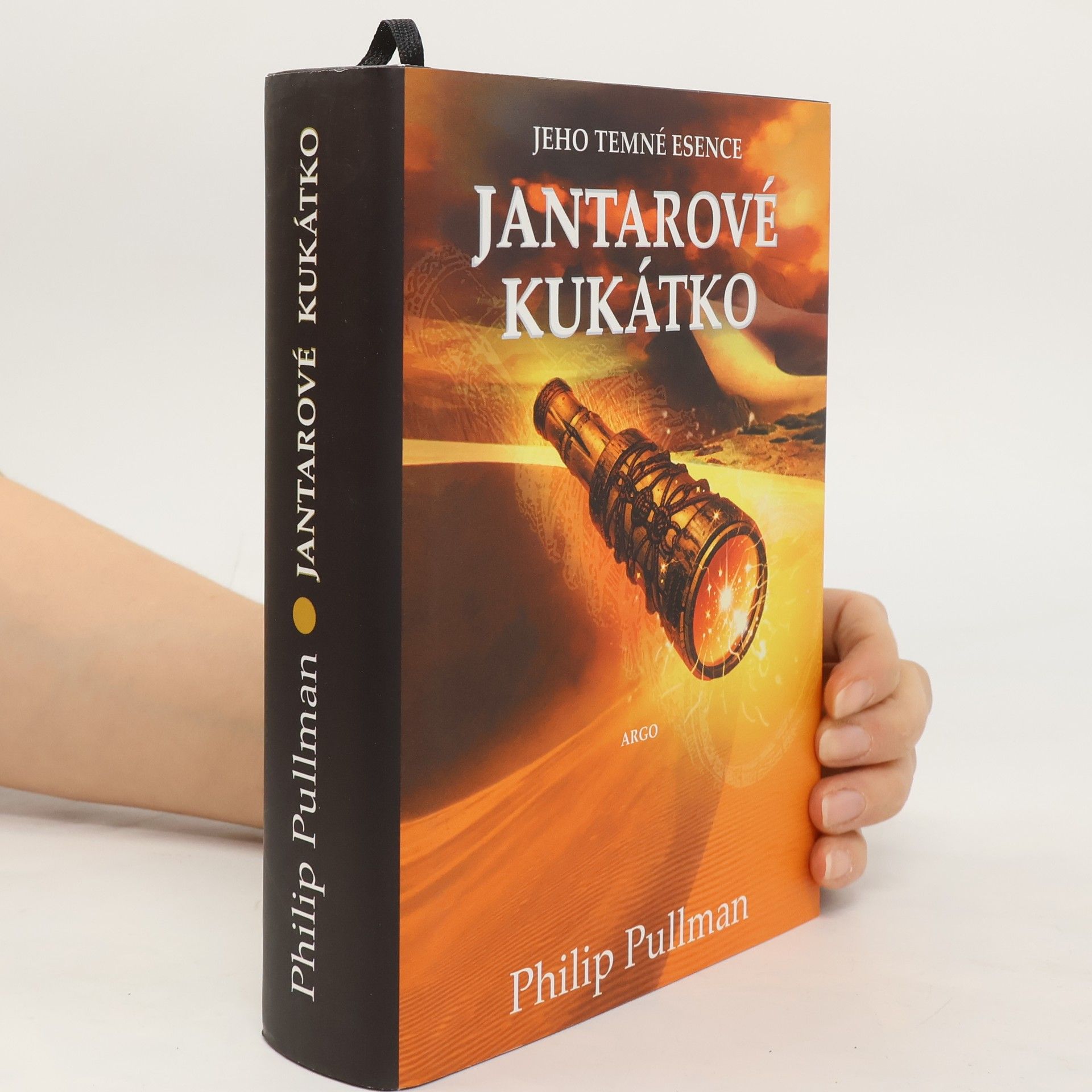 Philip Pullman Jantarové kukátko