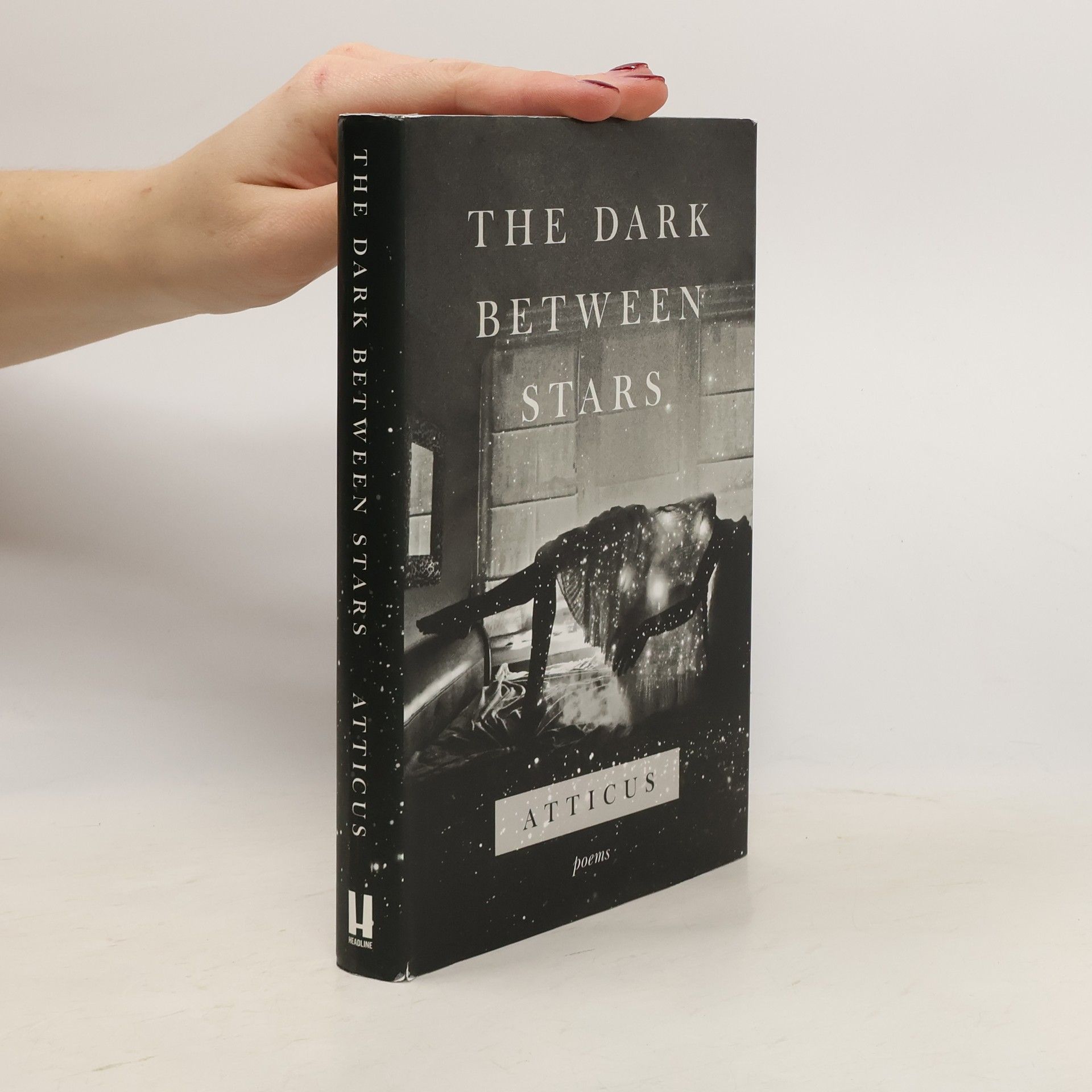 Atticus The dark between stars: Poems