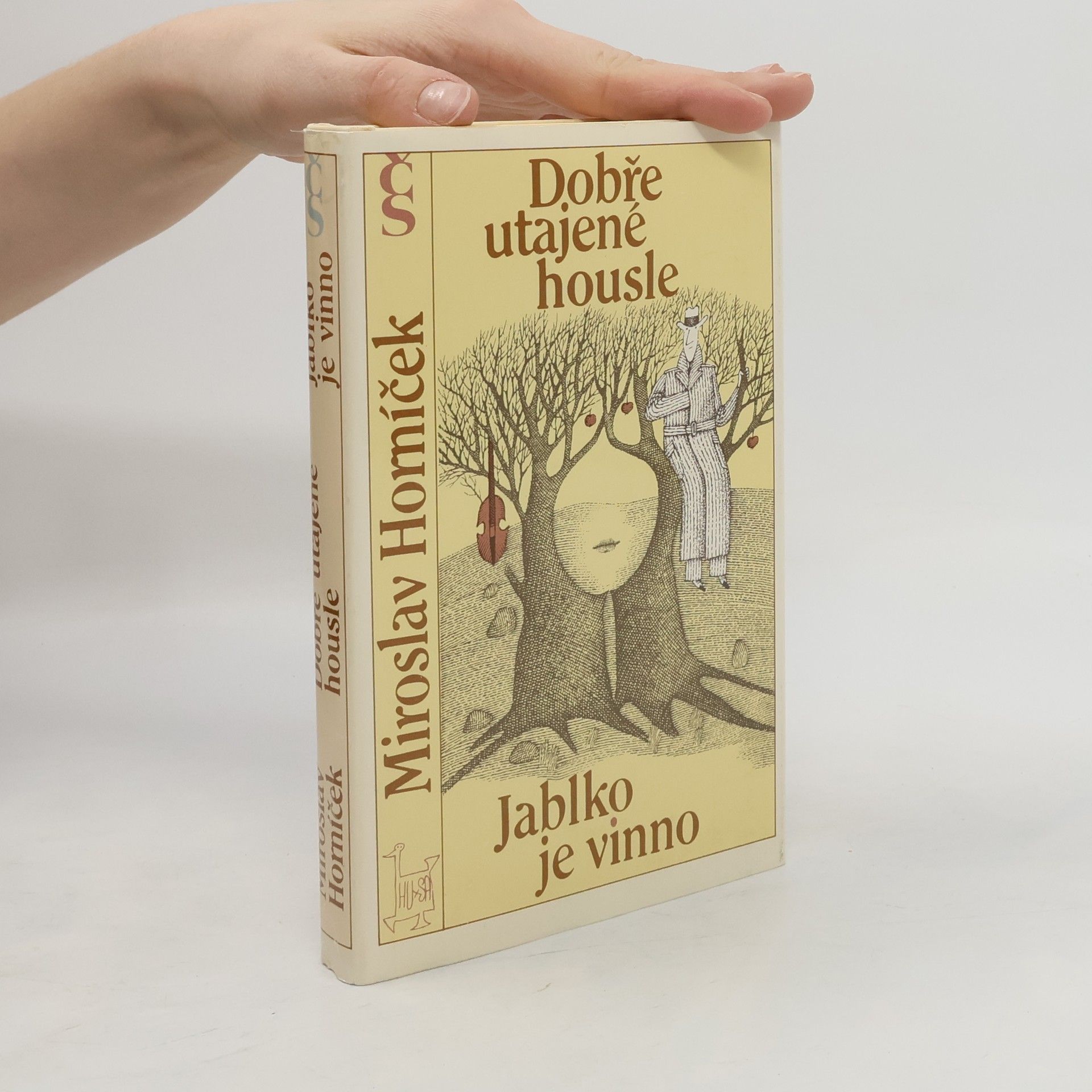 Dobře utajené housle. Jablko je vinno