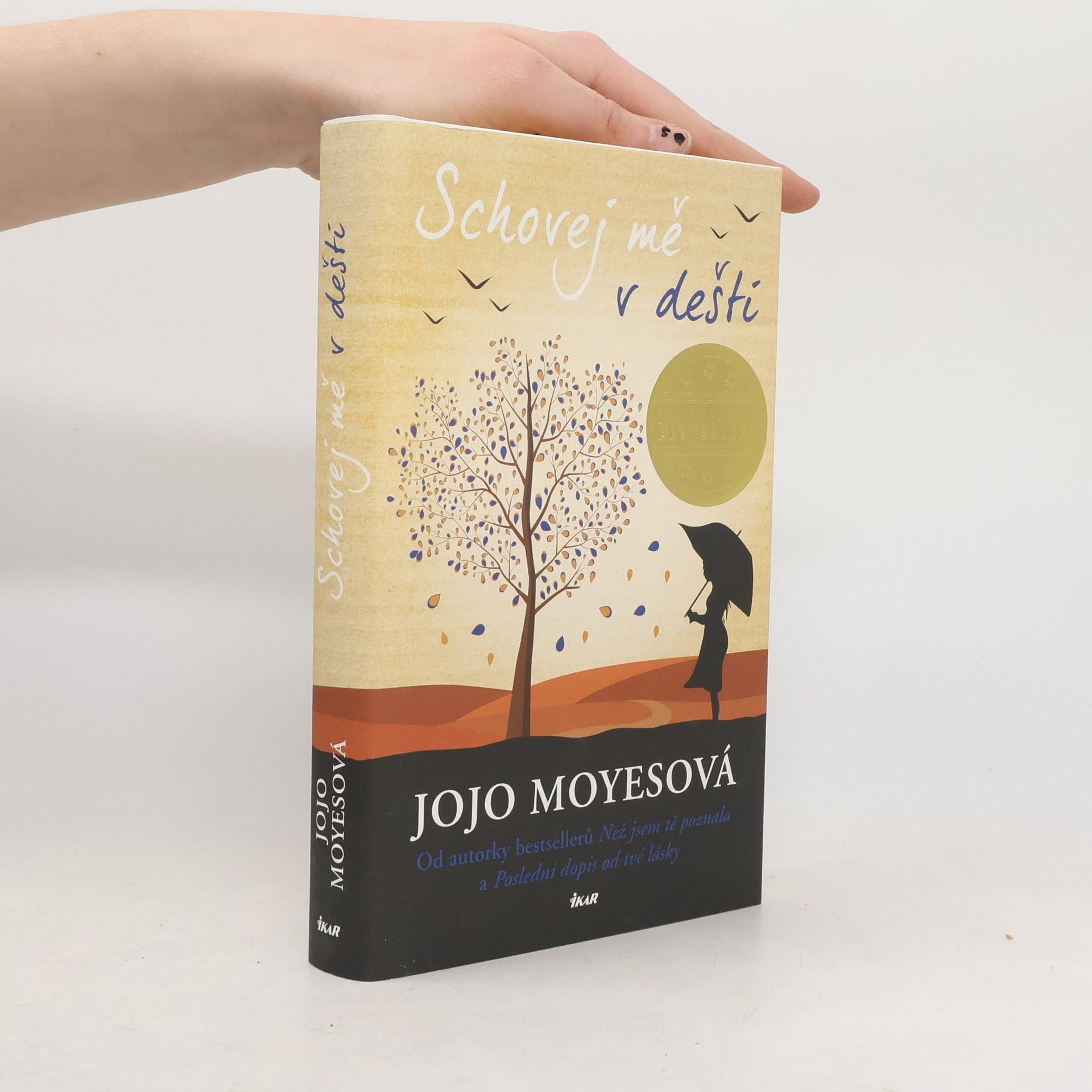 Jojo Moyes Schovej mě v dešti