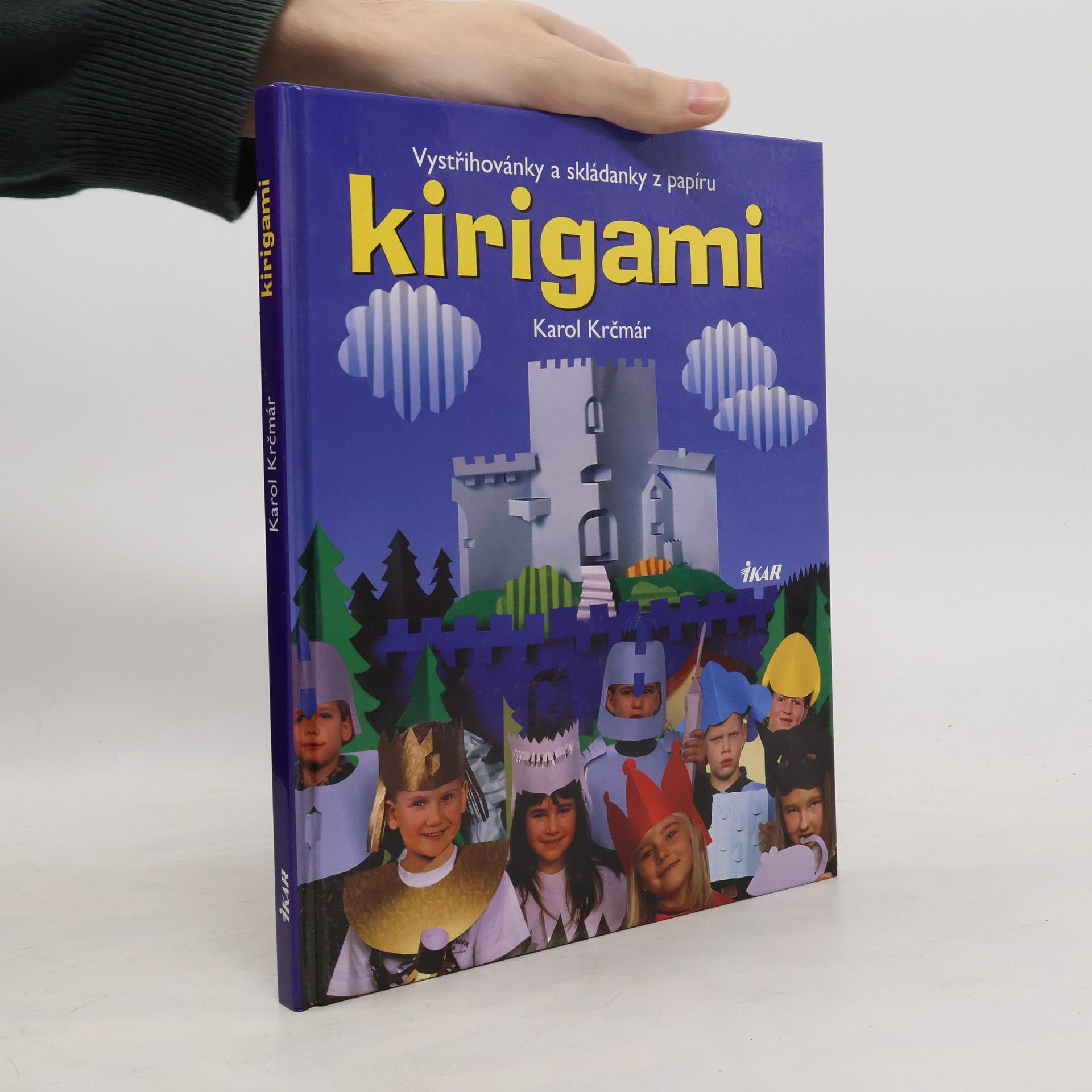 Karol Krčmár Kirigami. Vystřihovánky a skládanky - tvarování papíru stříháním a překládáním s návody, kresbami a fotografiemi