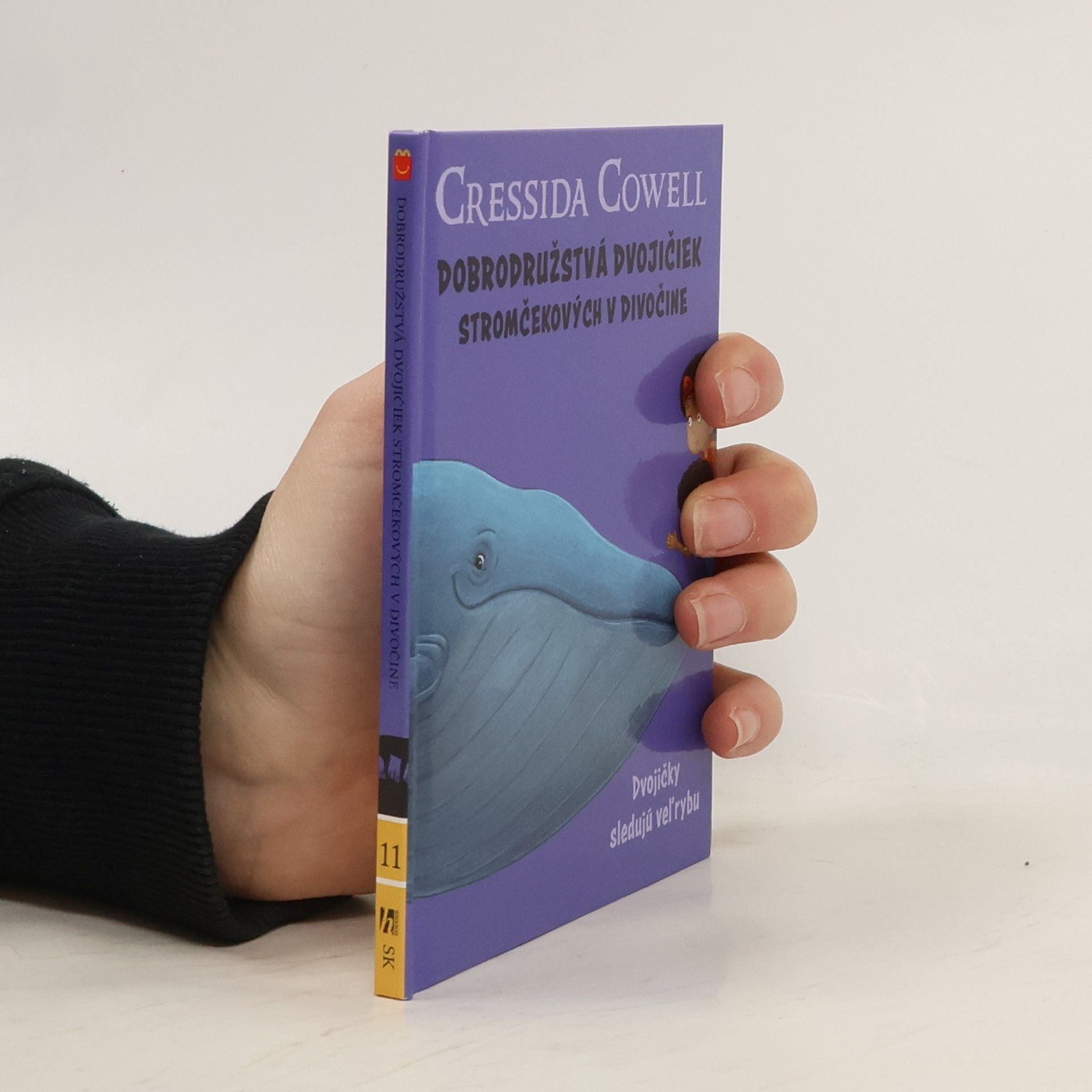 Cressida Cowell Stromovic dvojčata a jejich dobrodružství v divočině. Dvojčata pozorují velrybu