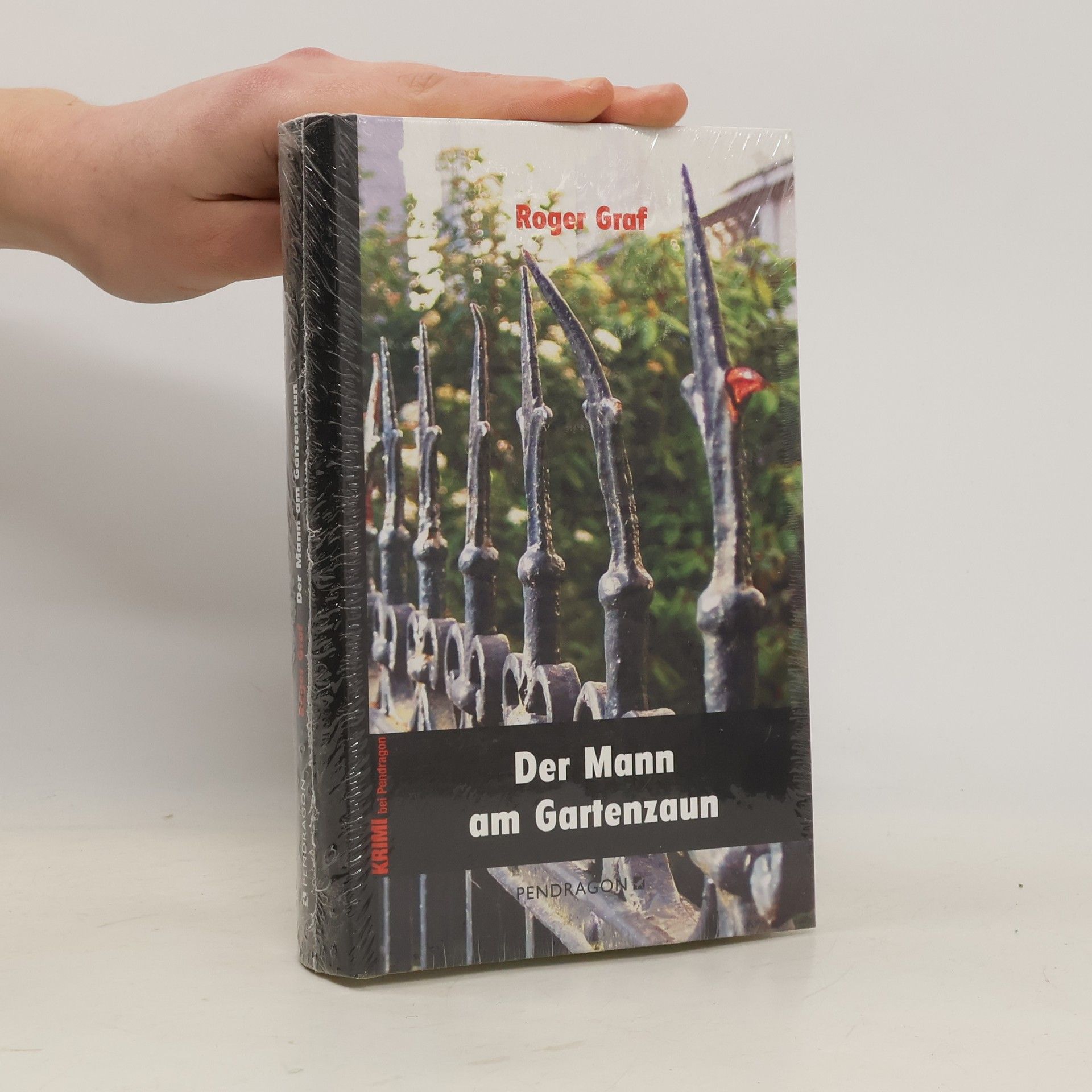 Der Mann am Gartenzaun