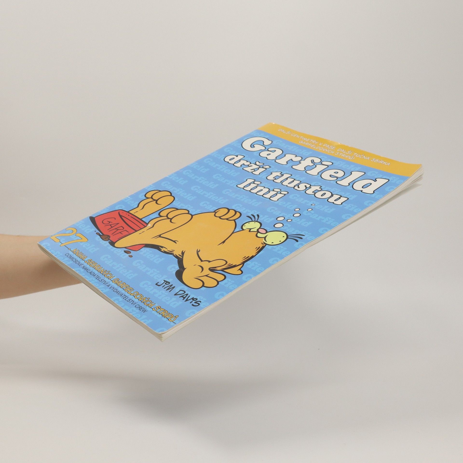 Jim Davis Garfield drží tlustou linii