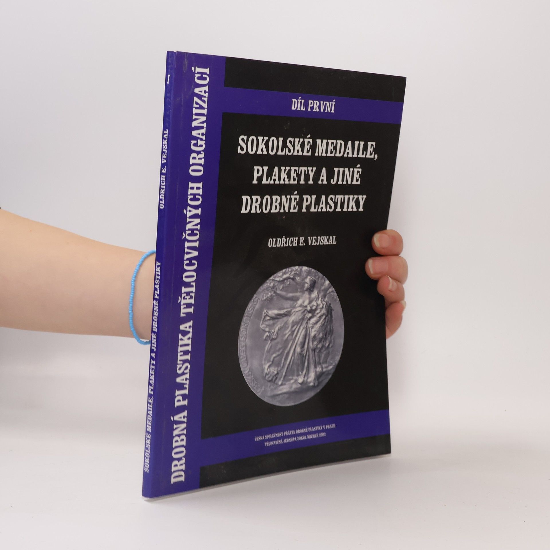 Oldřich E. Vejskal Drobná plastika tělovičných organizací. Díl 1., Sokolské medaile, plakety a jiné drobné plastiky