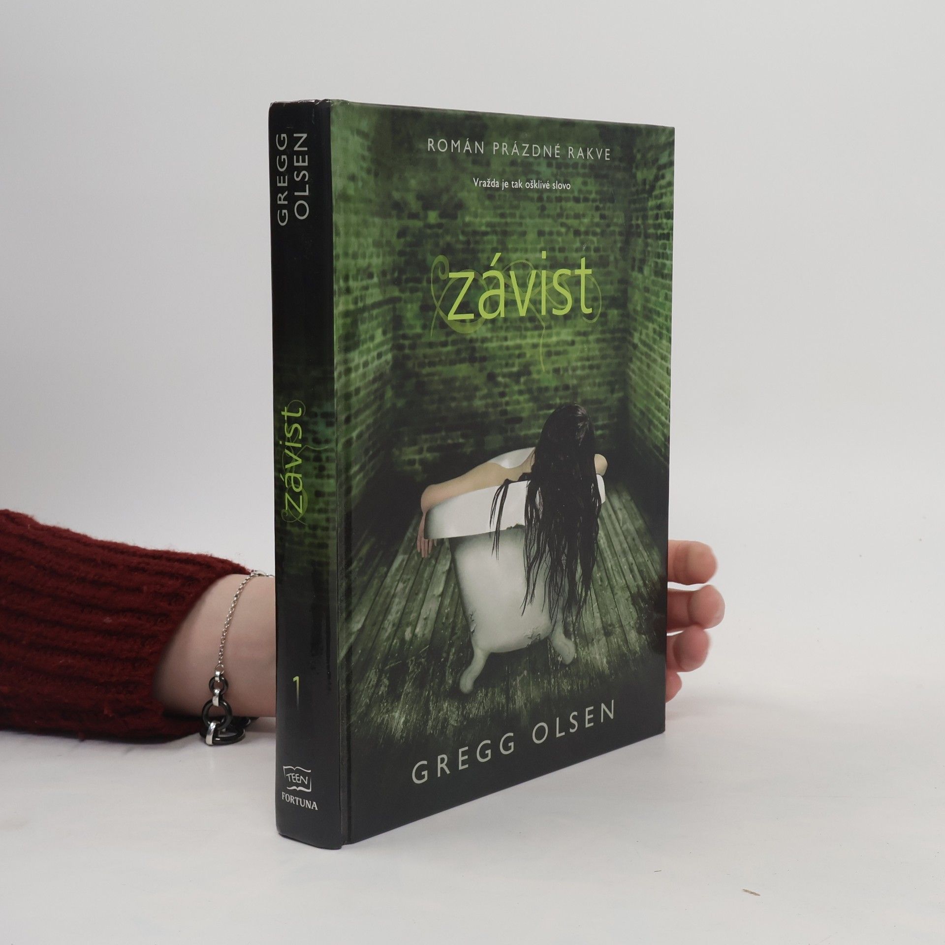 Gregg Olsen Román prázdné rakve: Závist