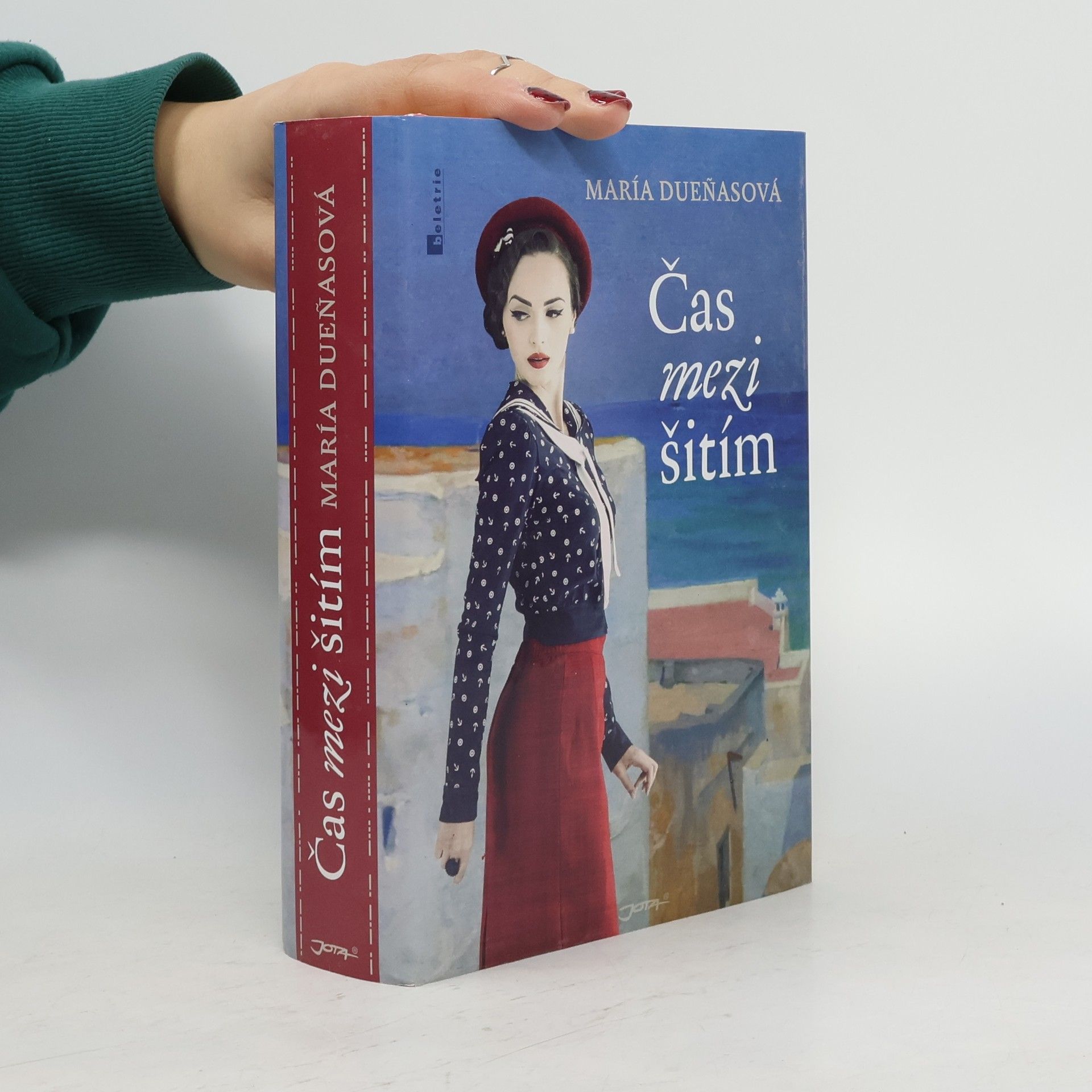 María Dueñas Vinuesa Čas mezi šitím