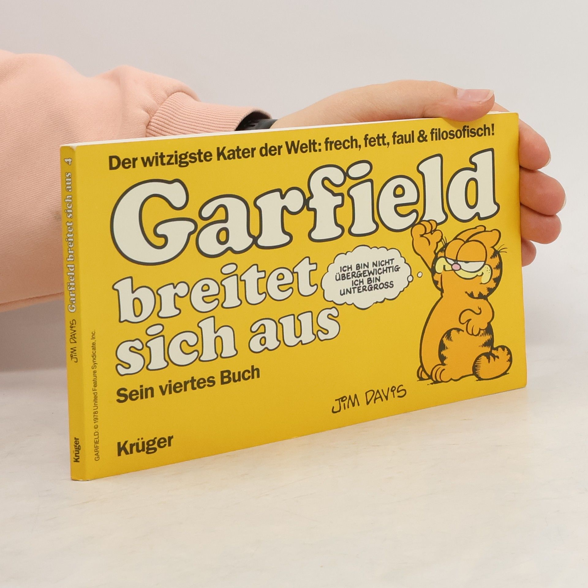 Jim Davis Garfield brietet sich aus