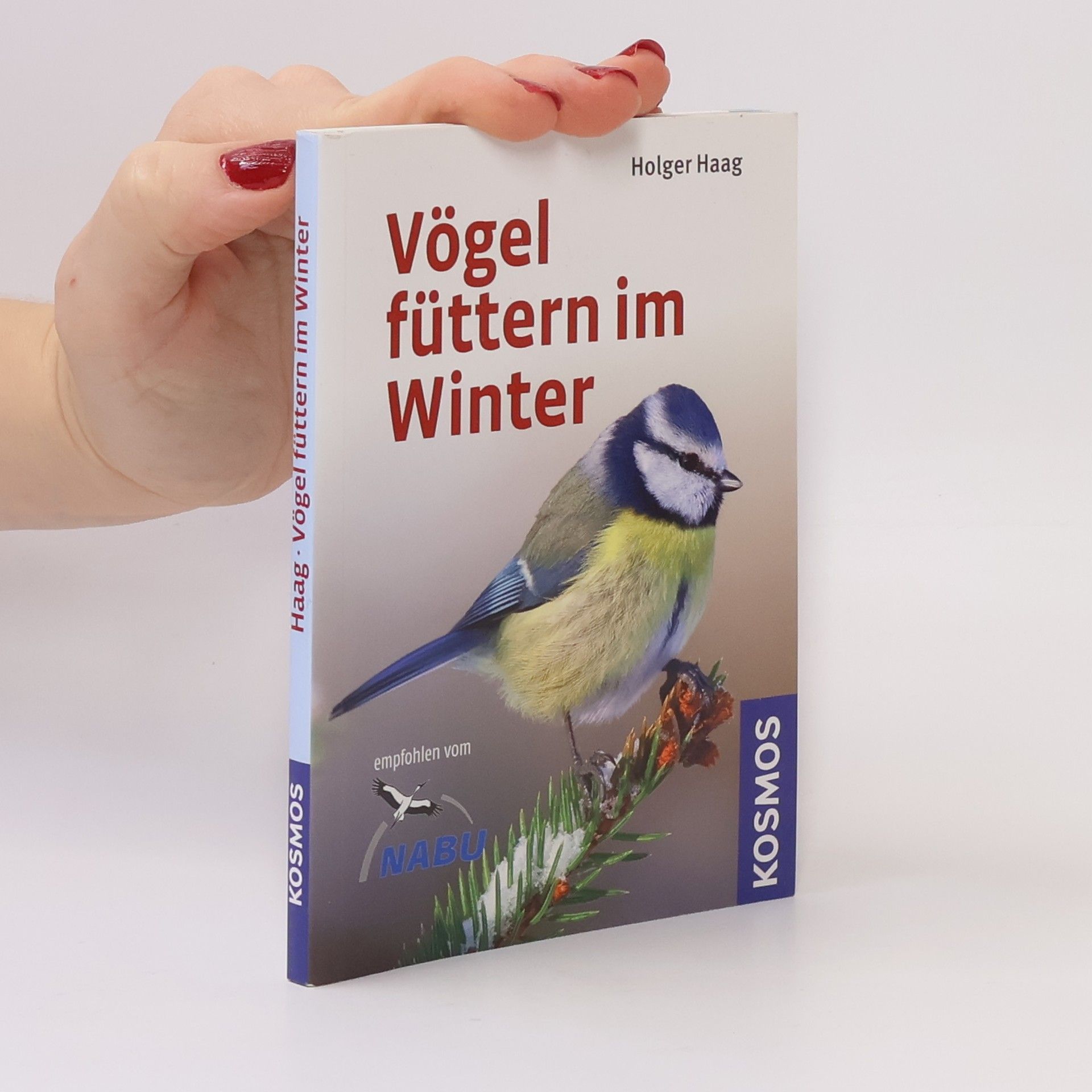 Holger Haag Vögel füttern im Winter