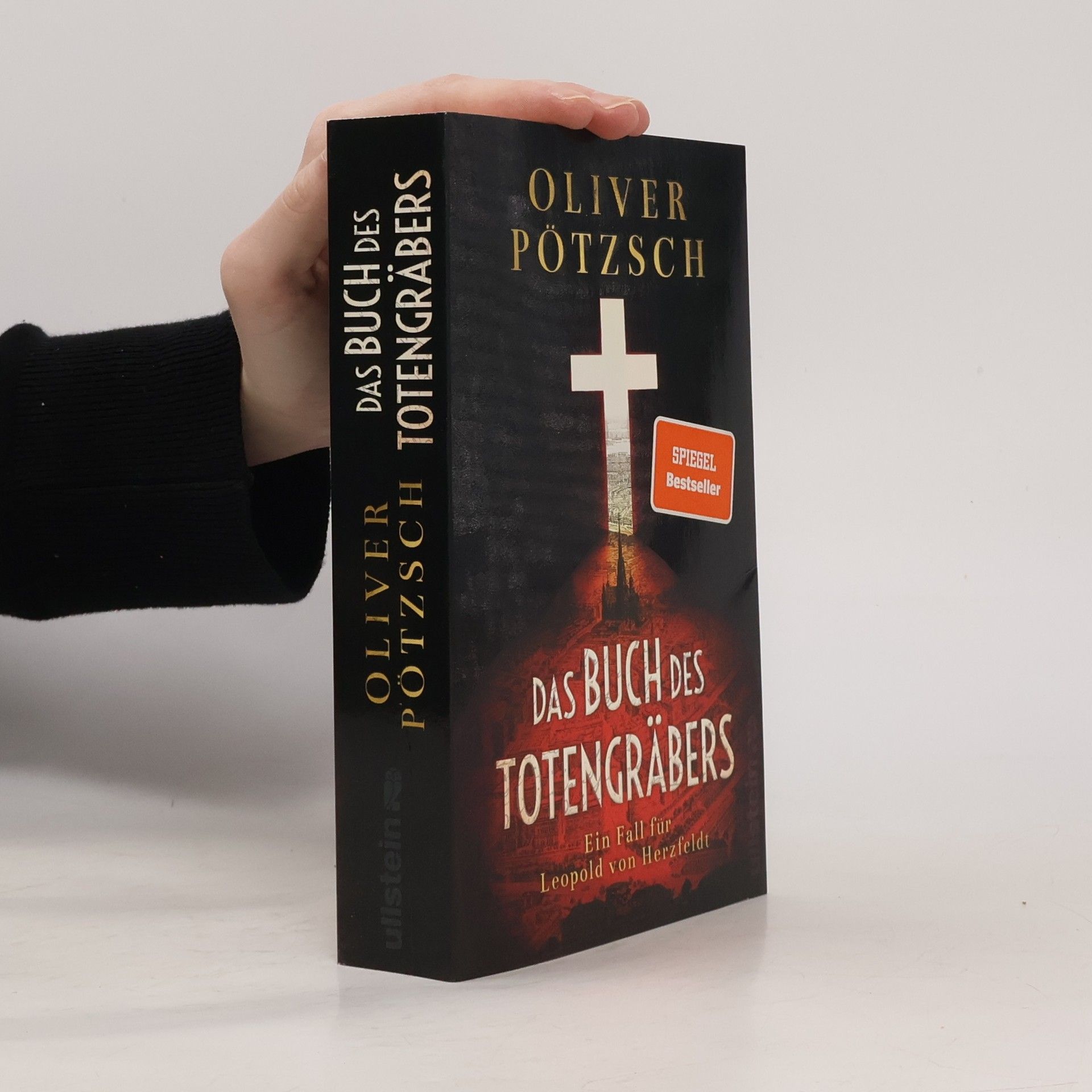 Das Buch des Totengräbers : ein Fall für Leopold von Herzfeldt