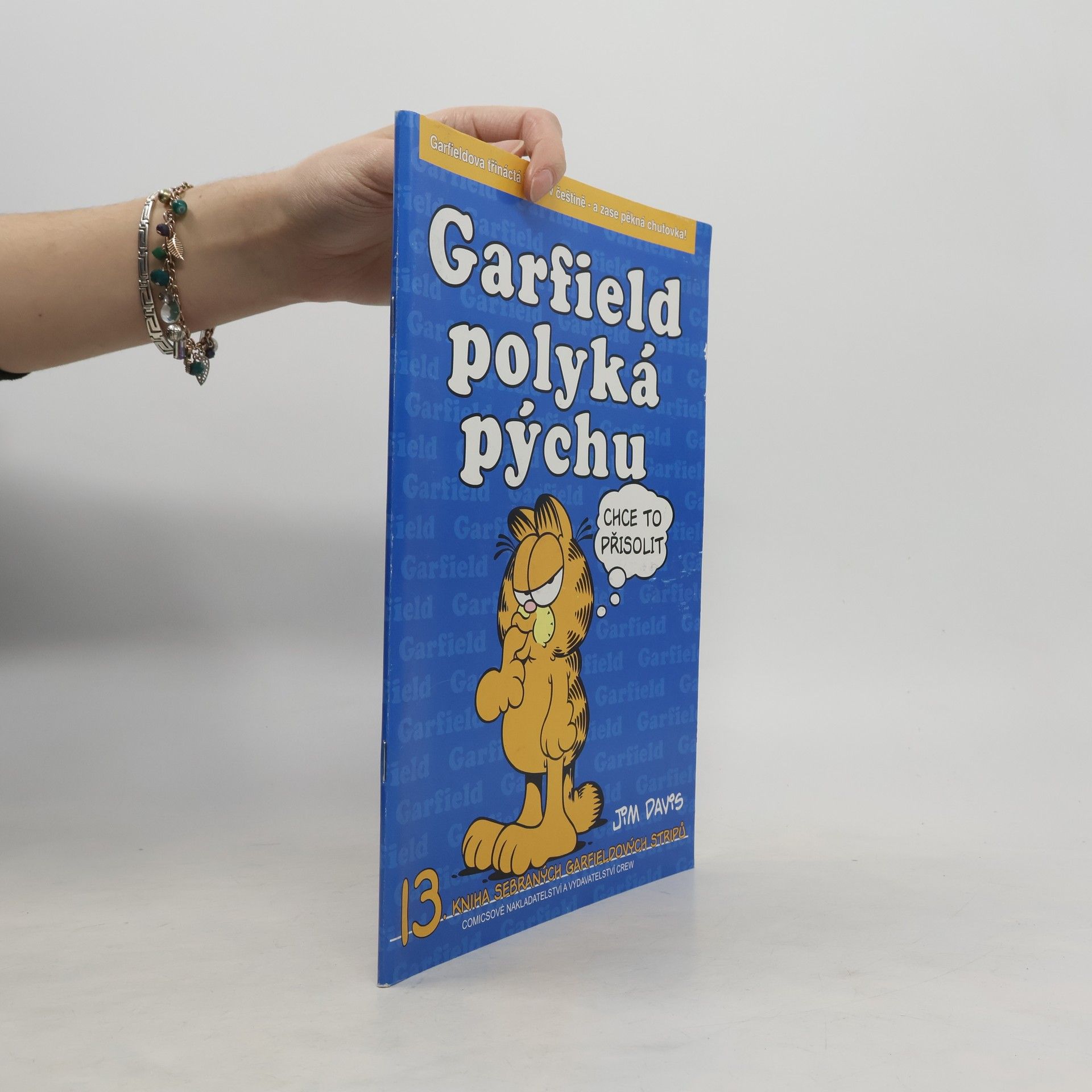 Jim Davis Garfield polyká pýchu